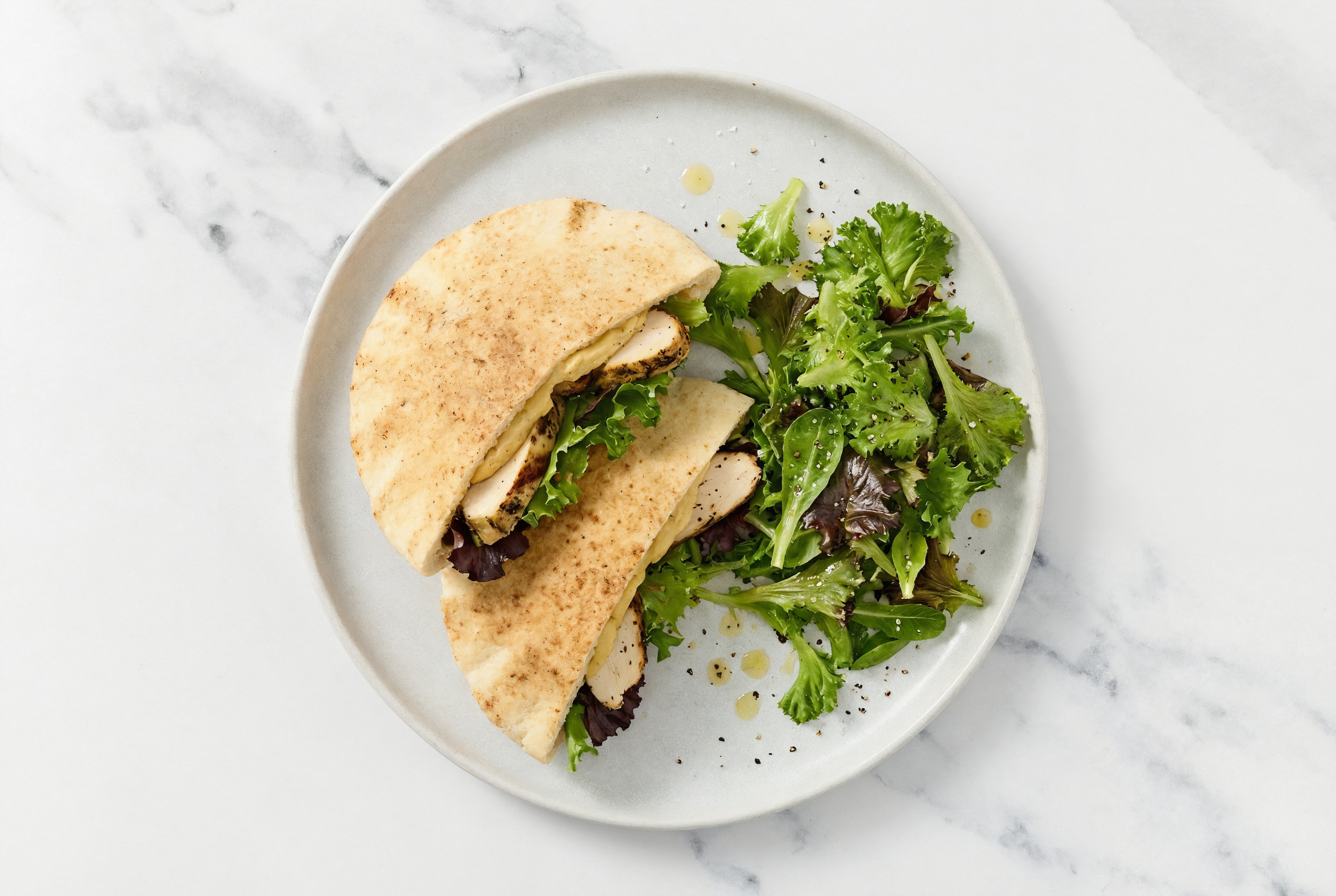 Hearty Shawarma-Inspired Mediterranean Grilled Chicken Breast Traditional Pita Sandwich