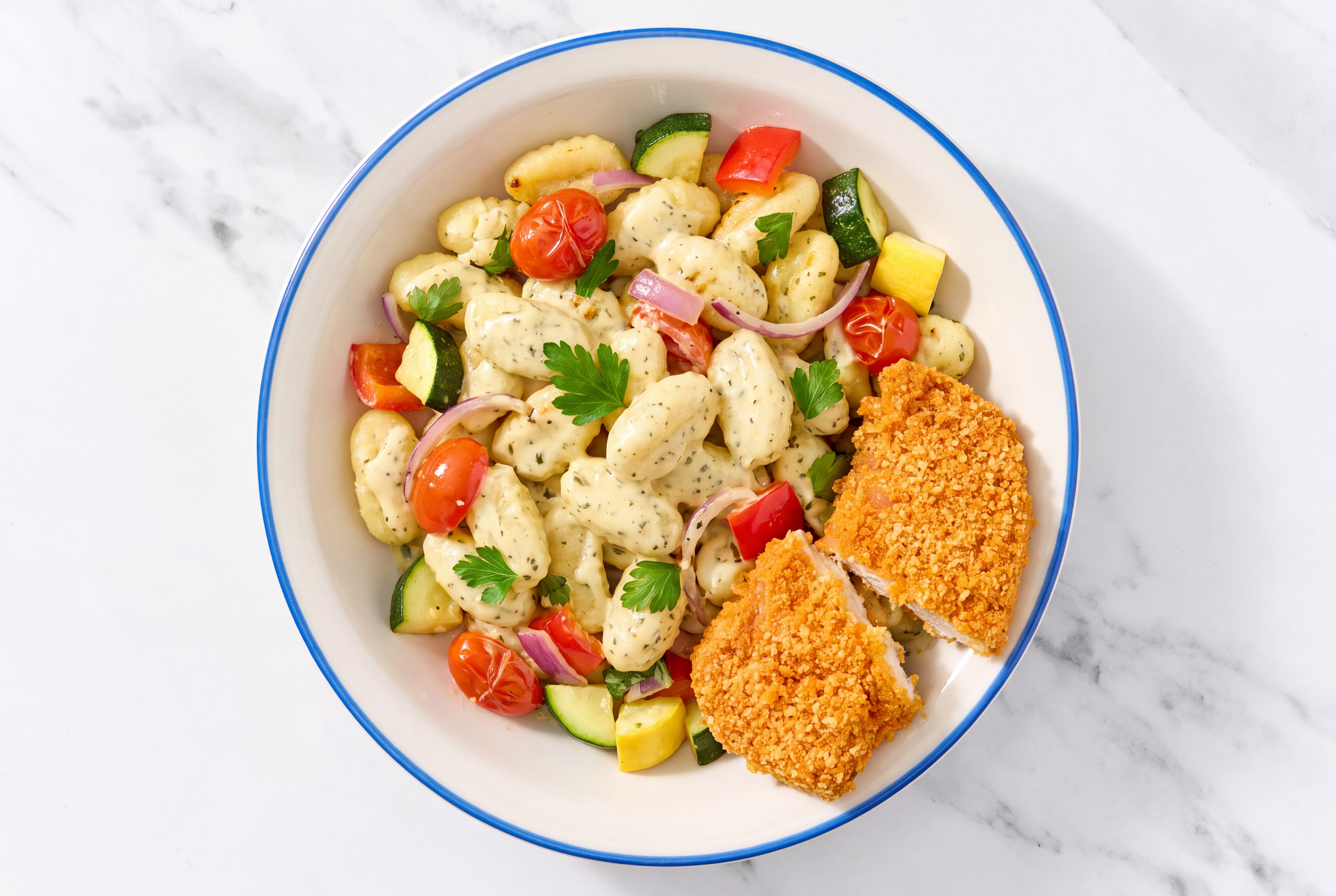 Crispy Hot Honey Chicken over Creamy Gnocchi with Mixed Veggies