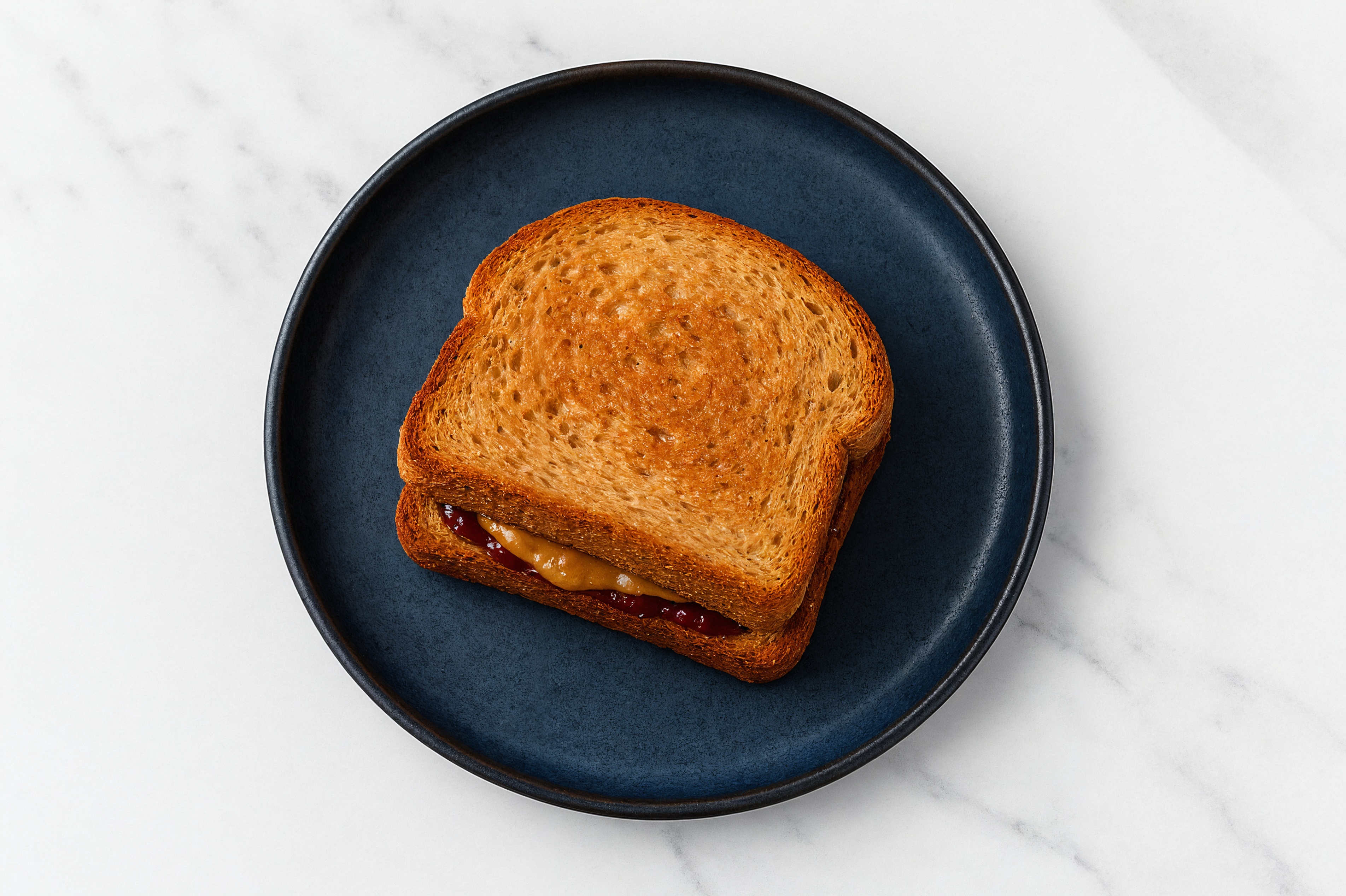 Almond Butter + Strawberry Jam Sprouted Wheat Sandwich