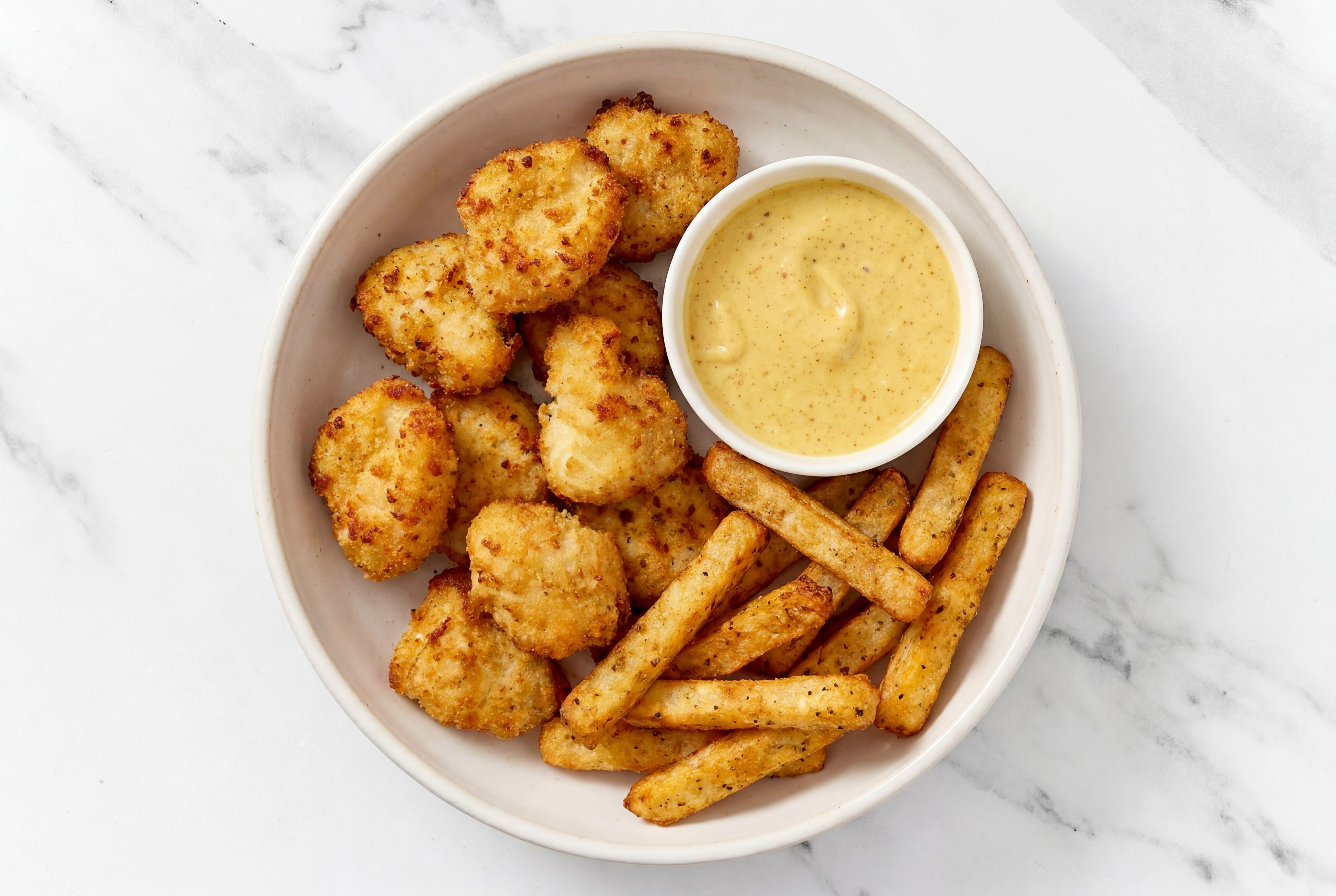 Chicken Nuggets + Veggie Super Fries