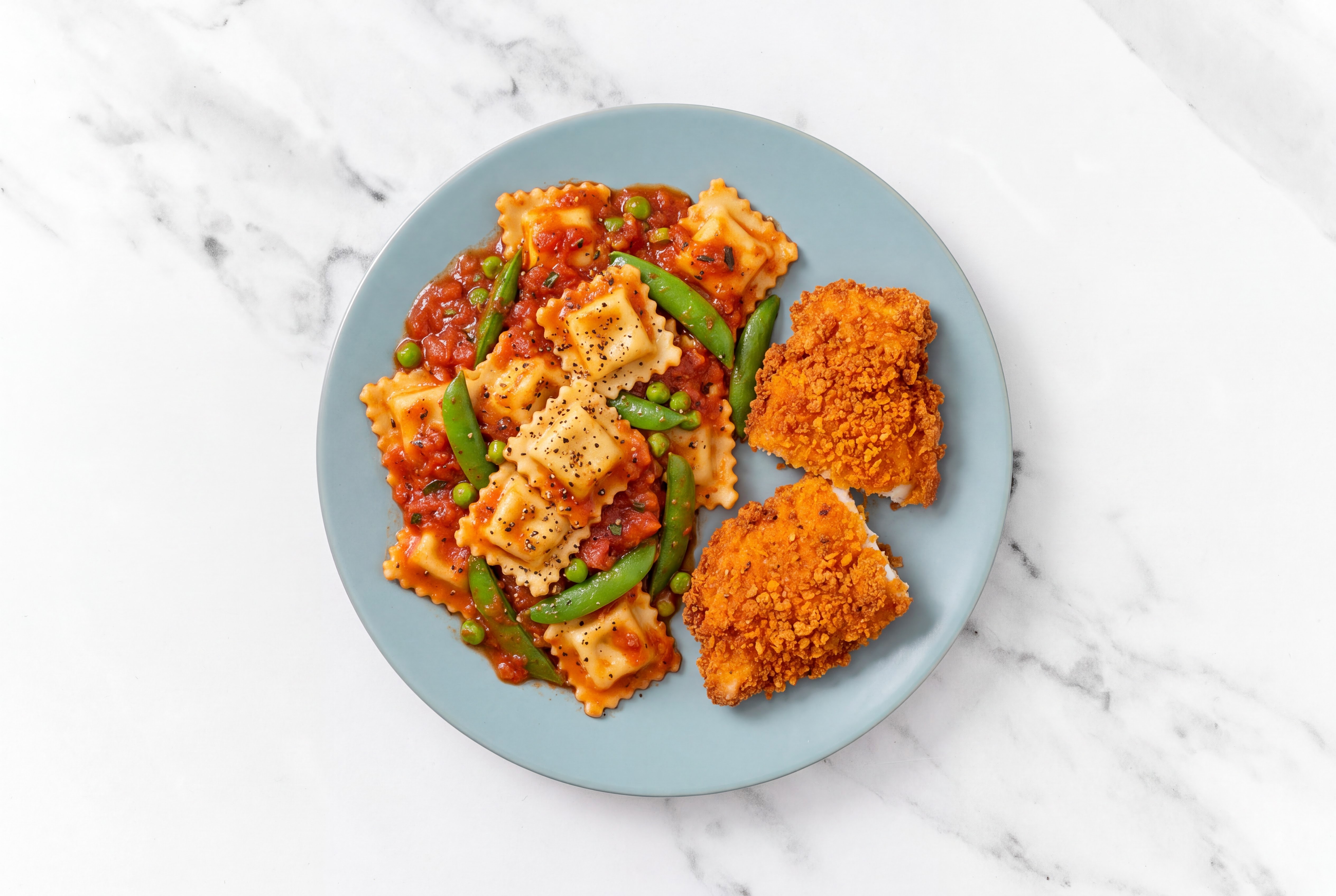 Crispy Hot Honey Chicken over Marinara Ravioli with Snap Peas