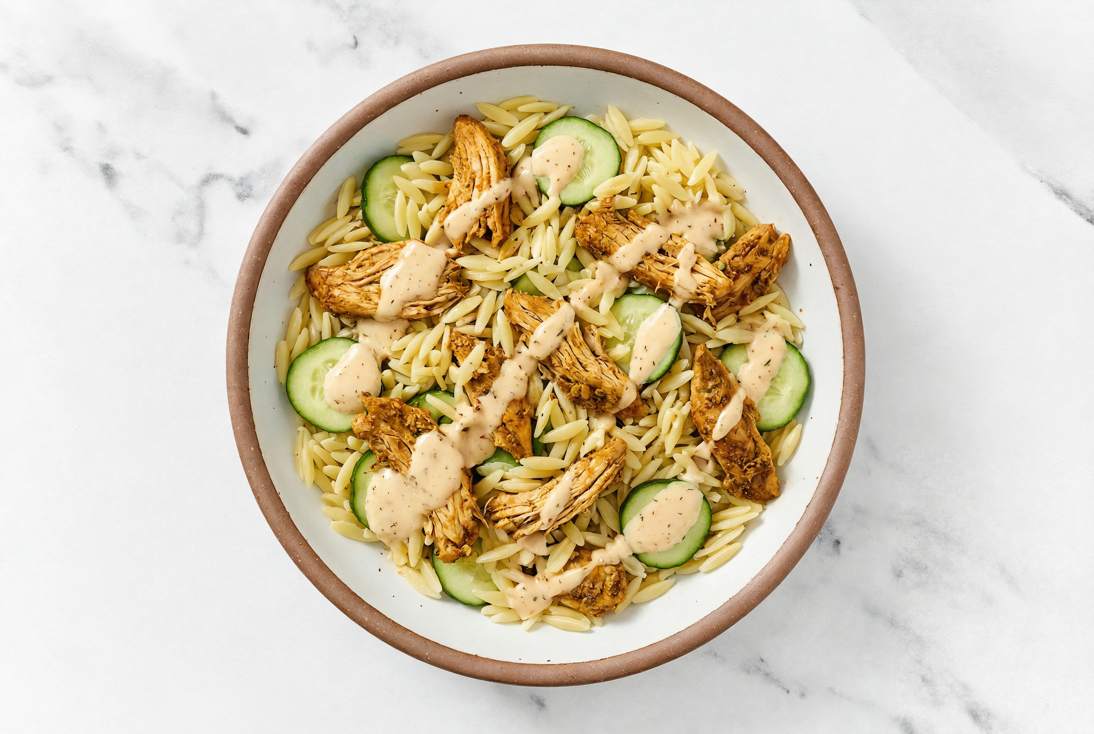 Shawarma Chicken + Orzo Buffalo Ranch Bowl