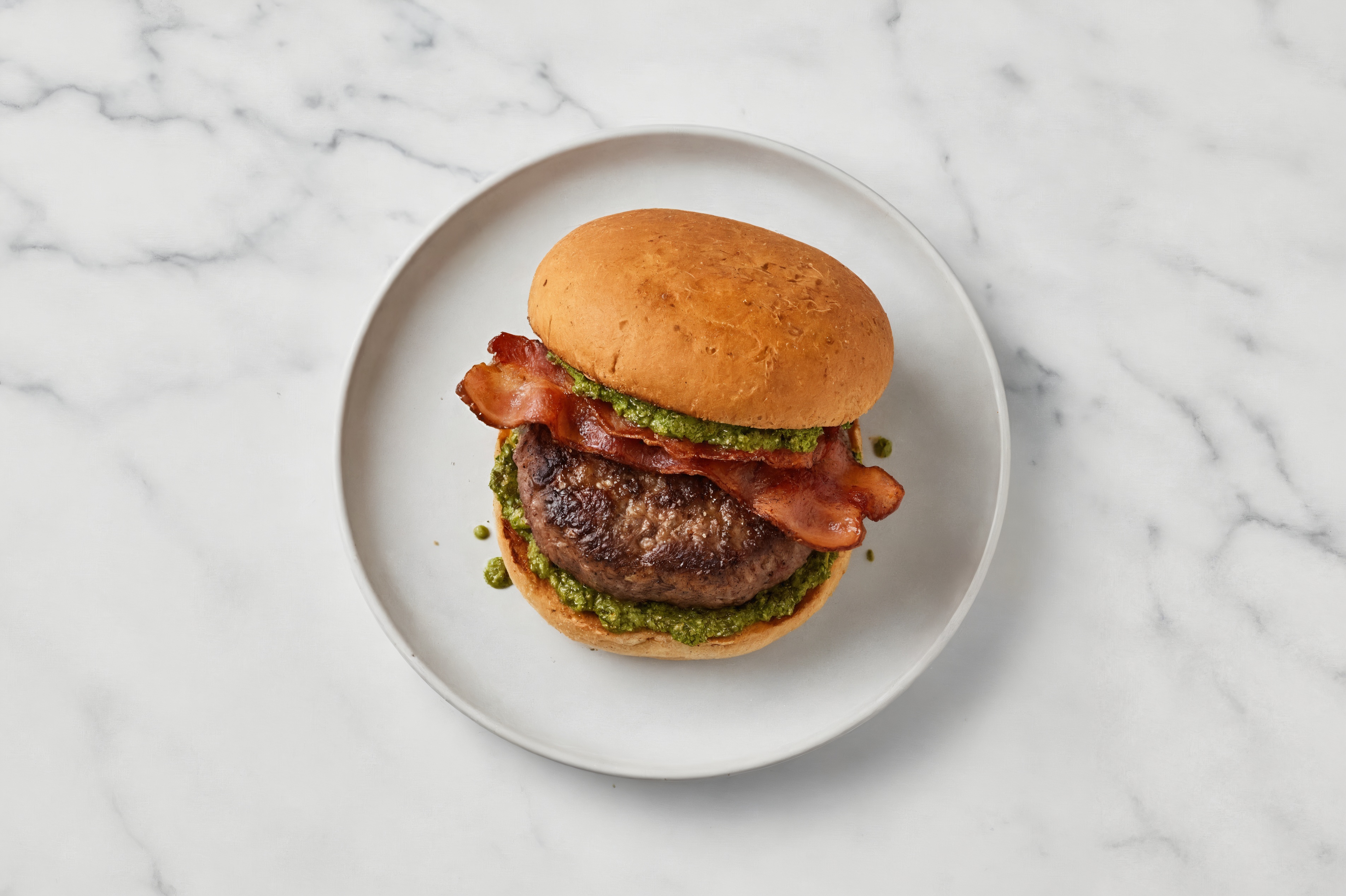 Bison Burger on Sprouted Grain with Spinach Pesto & Turkey Bacon