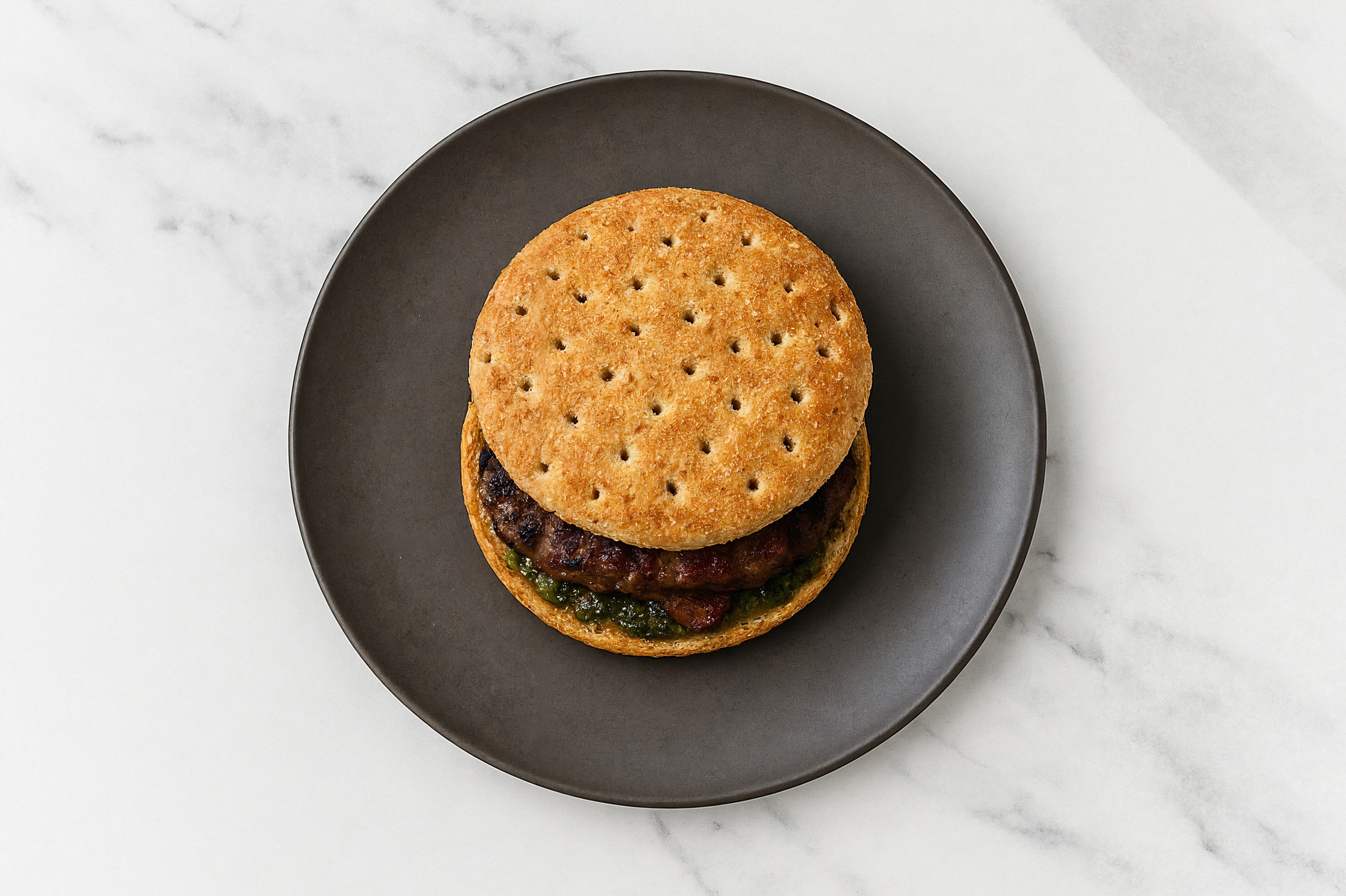 Bison Burger on Multigrain with Spinach Pesto & Turkey Bacon