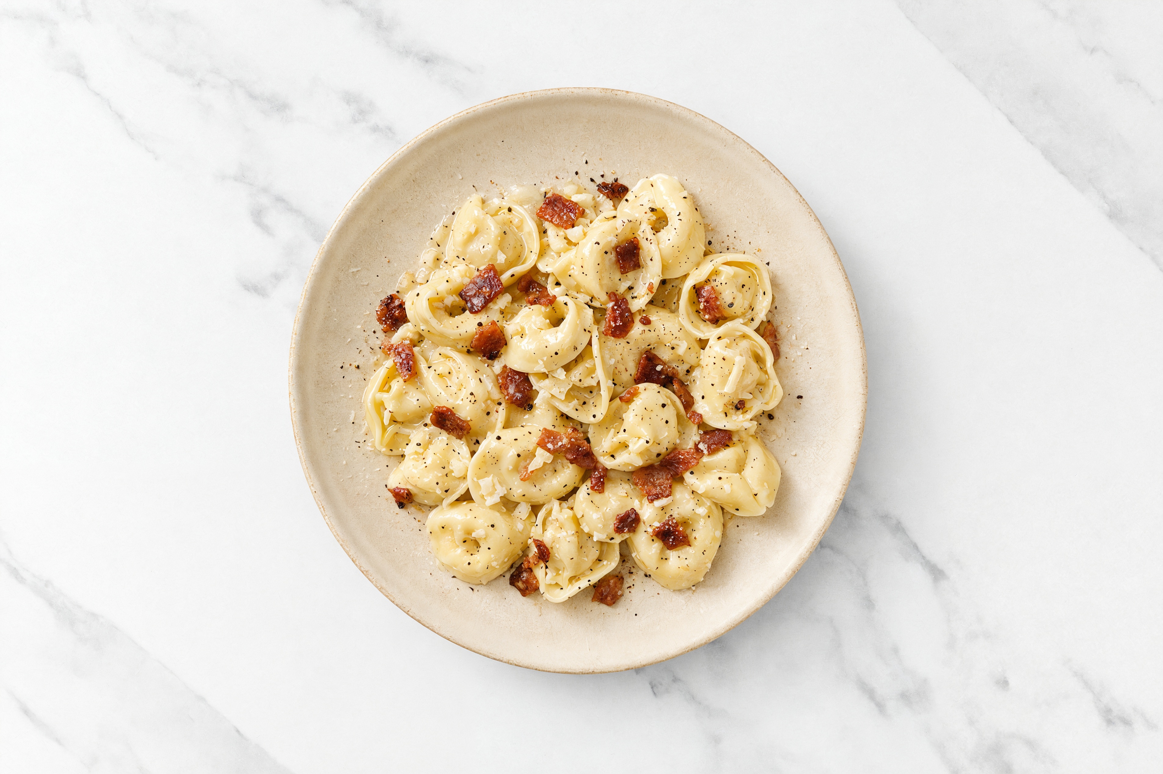 Tortelloni Carbonara with Grated Parmesan Cheese