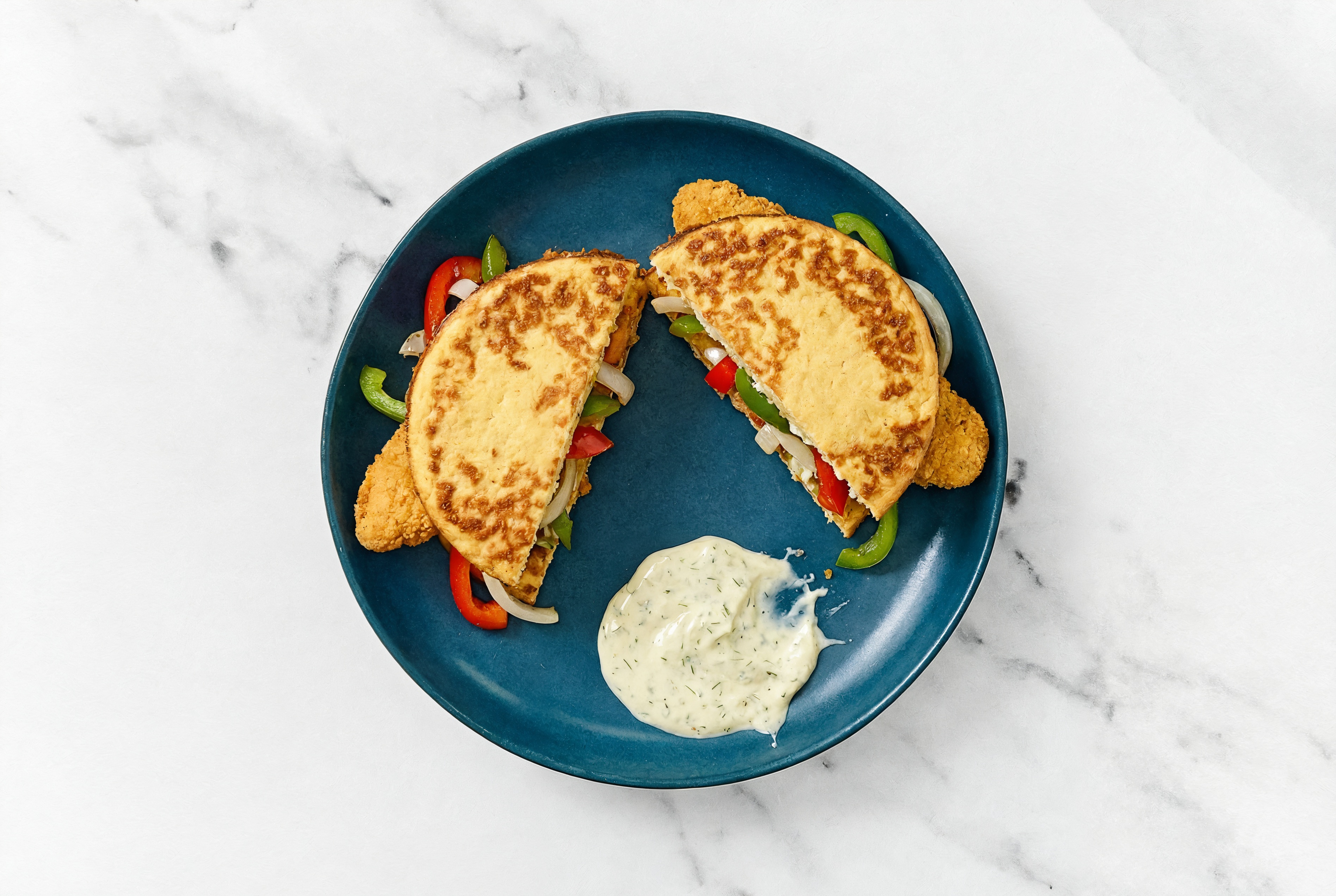 Dill Pickle "Chicken" Tenders Sandwich with Peppers + Onion on Cauliflower Rounds