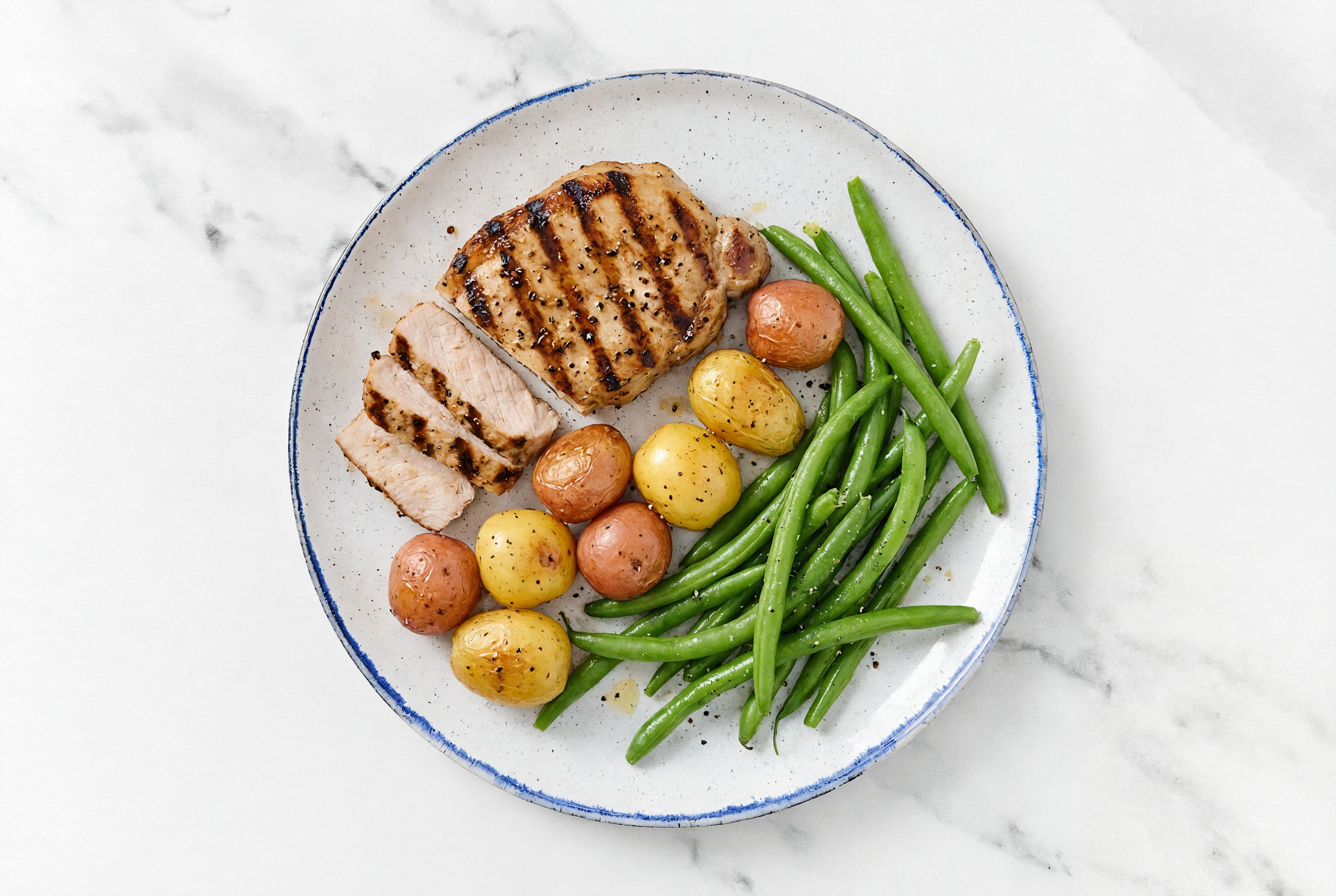 Pork Chops + Roasted Potatoes with Lemony Beans