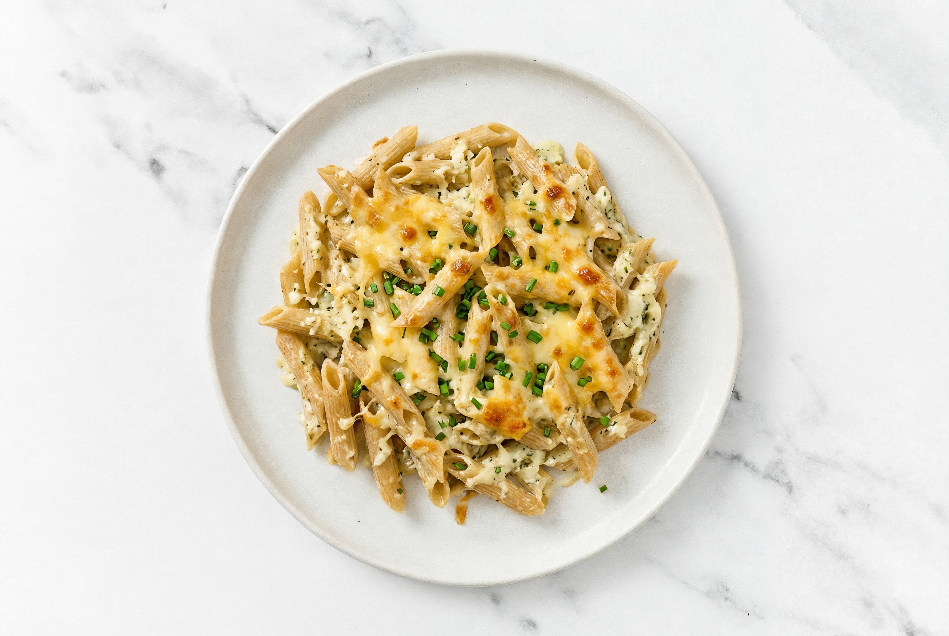Herby Baked Cauliflower Mac 'n Cheese with Shredded Sharp Cheddar Cheese