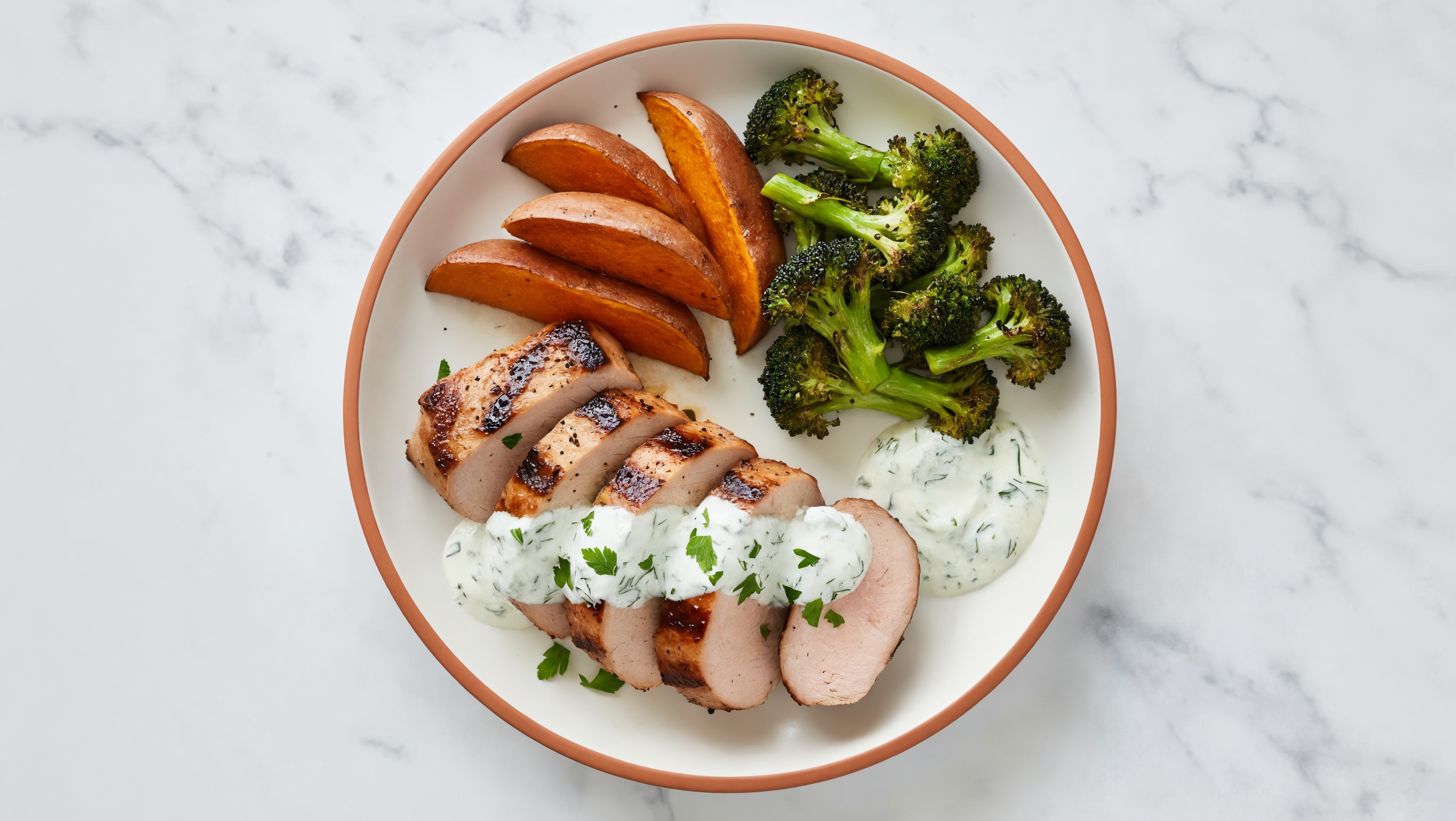 Savory Sheet-Pan Pork Tenderloin + Veggies with Tzatziki with Broccoli Florets