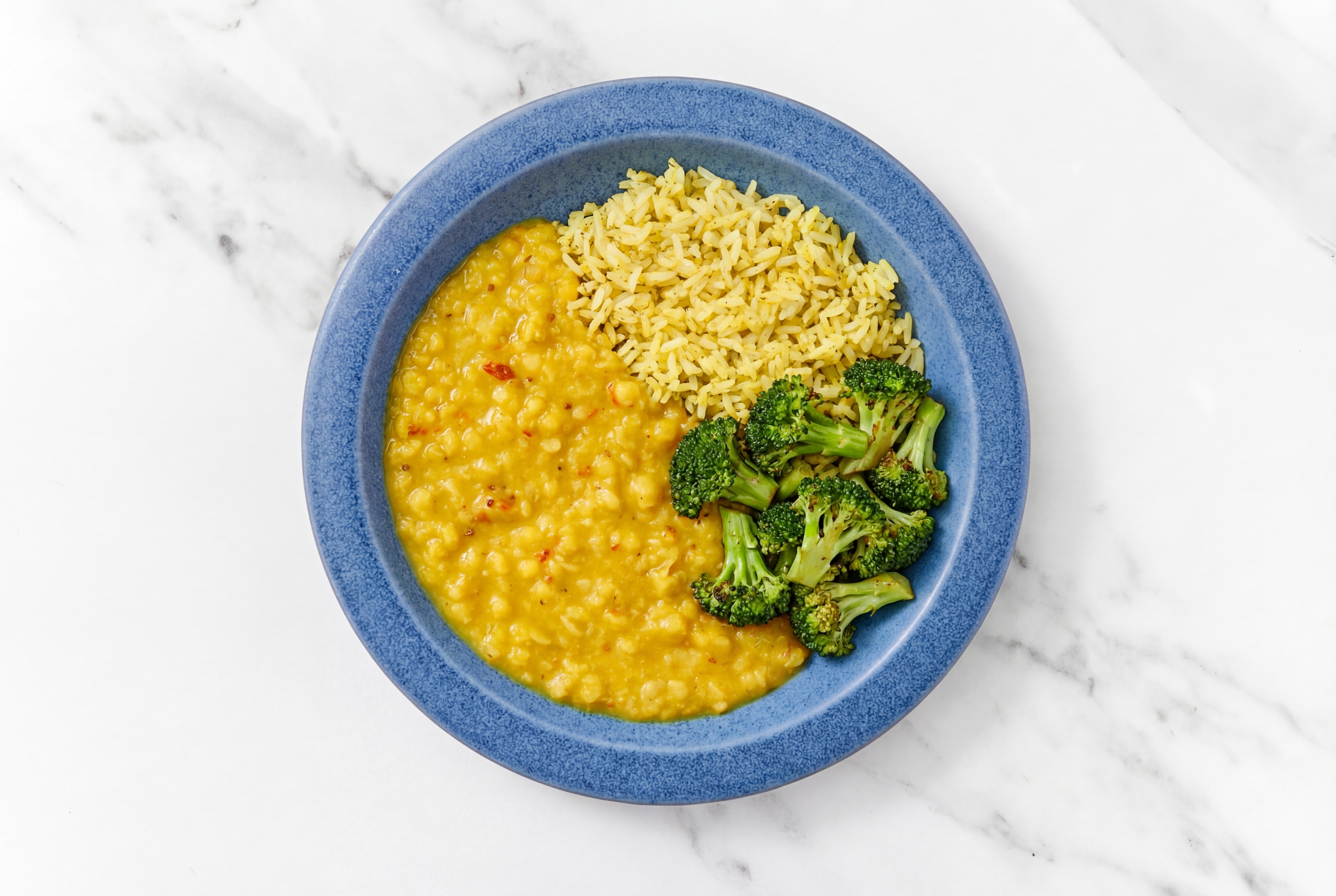 Broccoli Bunches Red Lentil Dal Bowl over Jasmine Rice