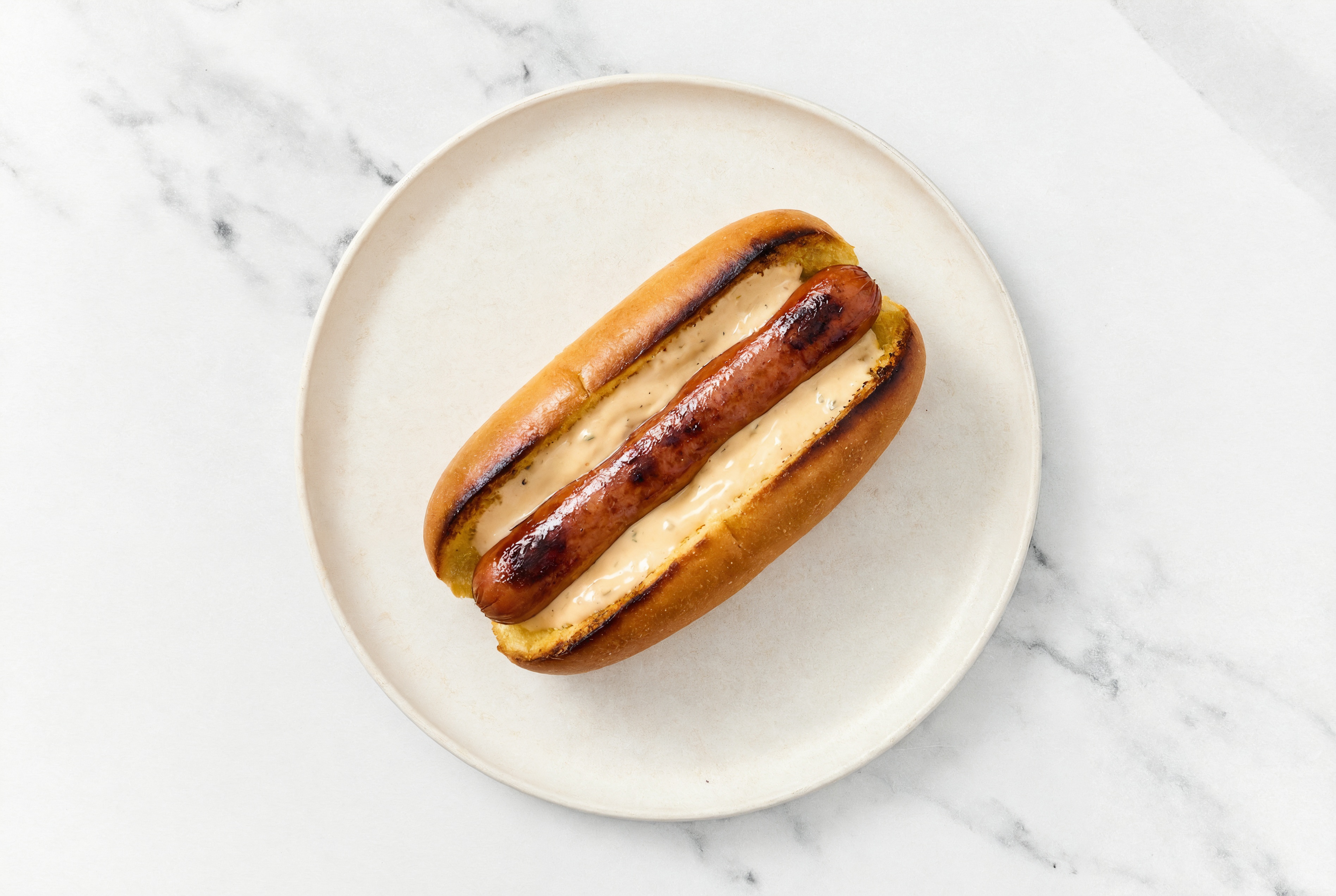 Beef Hot Dog with Awesome Sauce on Brioche