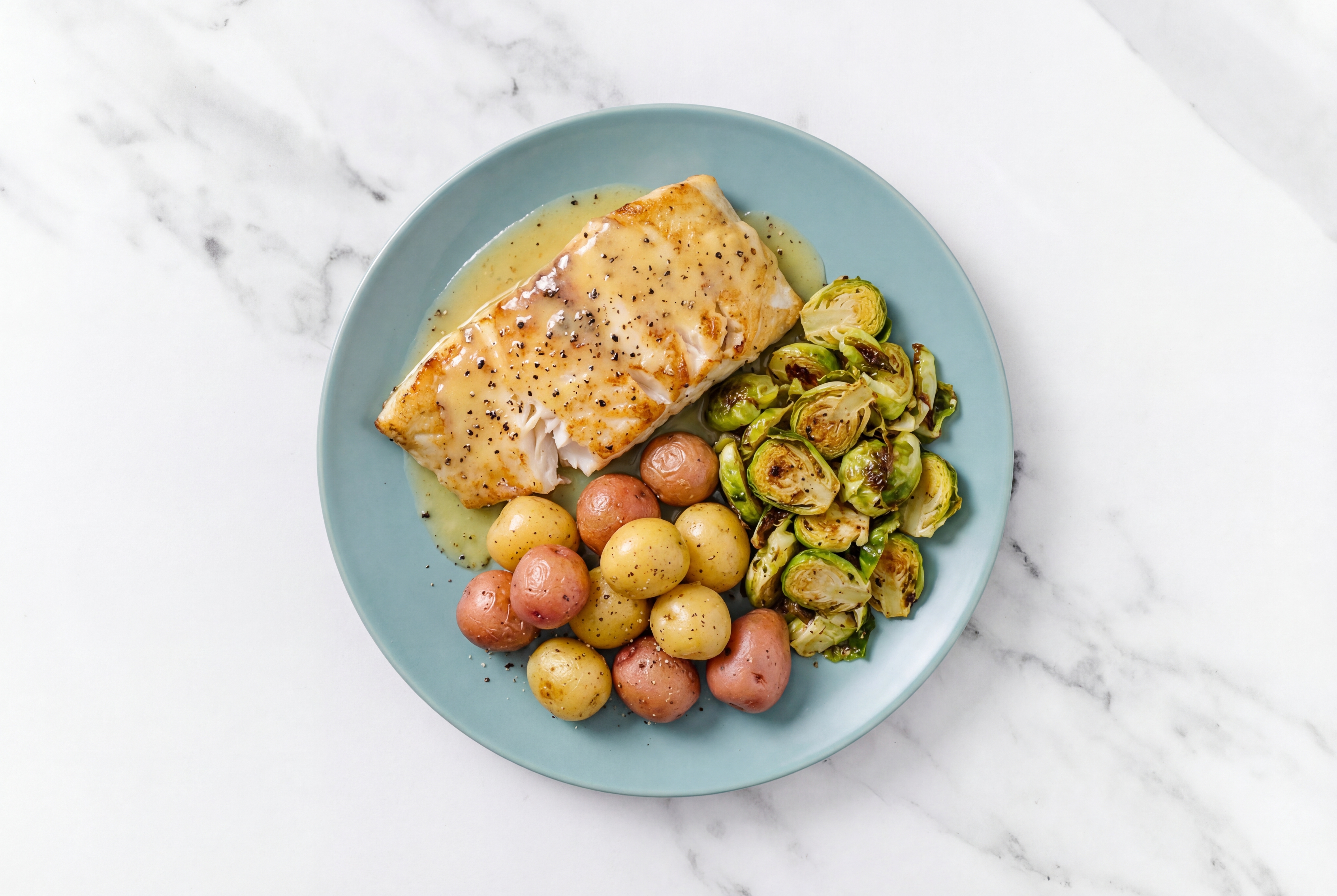 Lemon-Butter Barramundi with Creamer Potatoes & Brussels