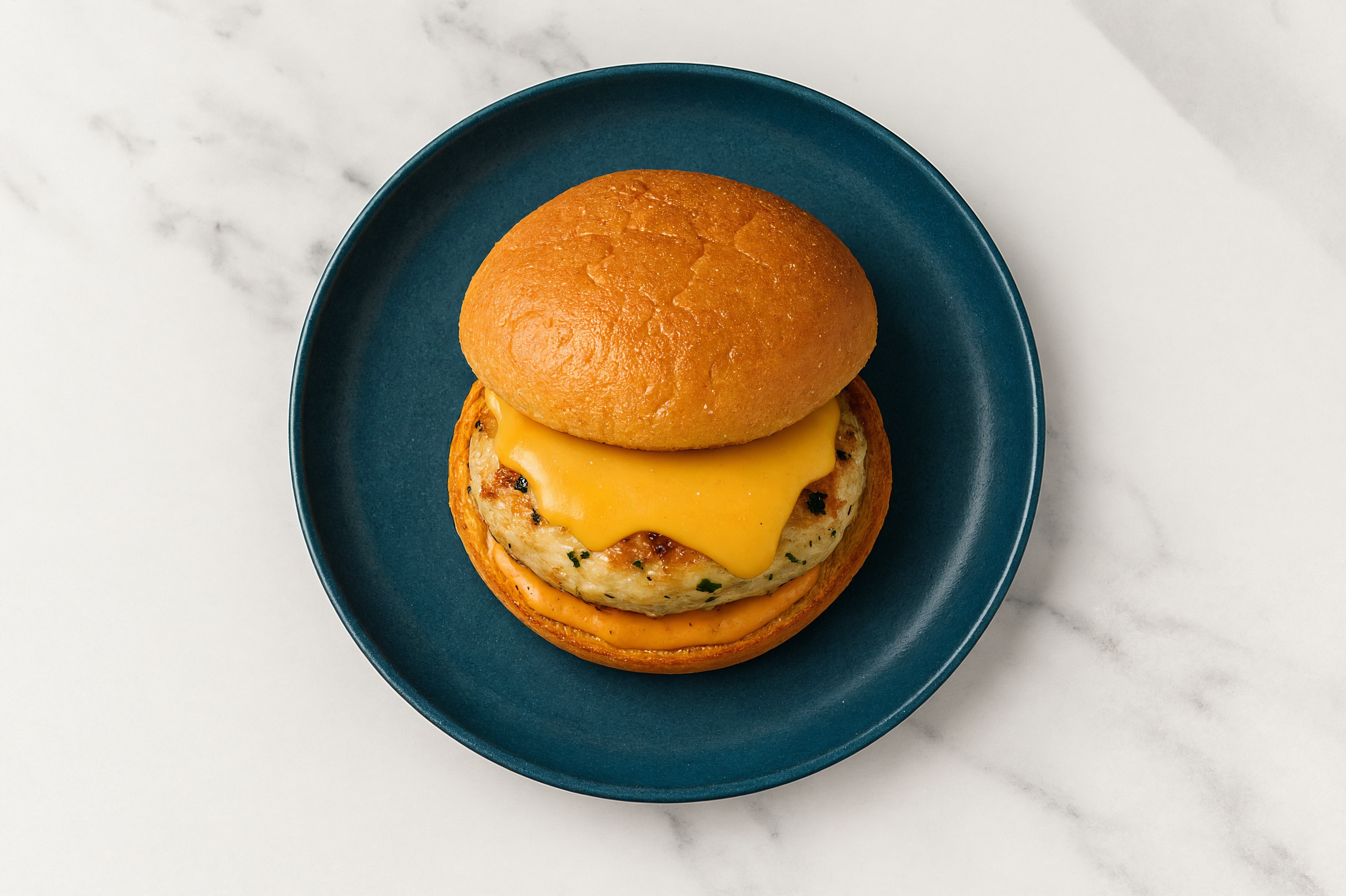 Gouda Chicken Burger on GF Bun with Smoky BBQ Sauce