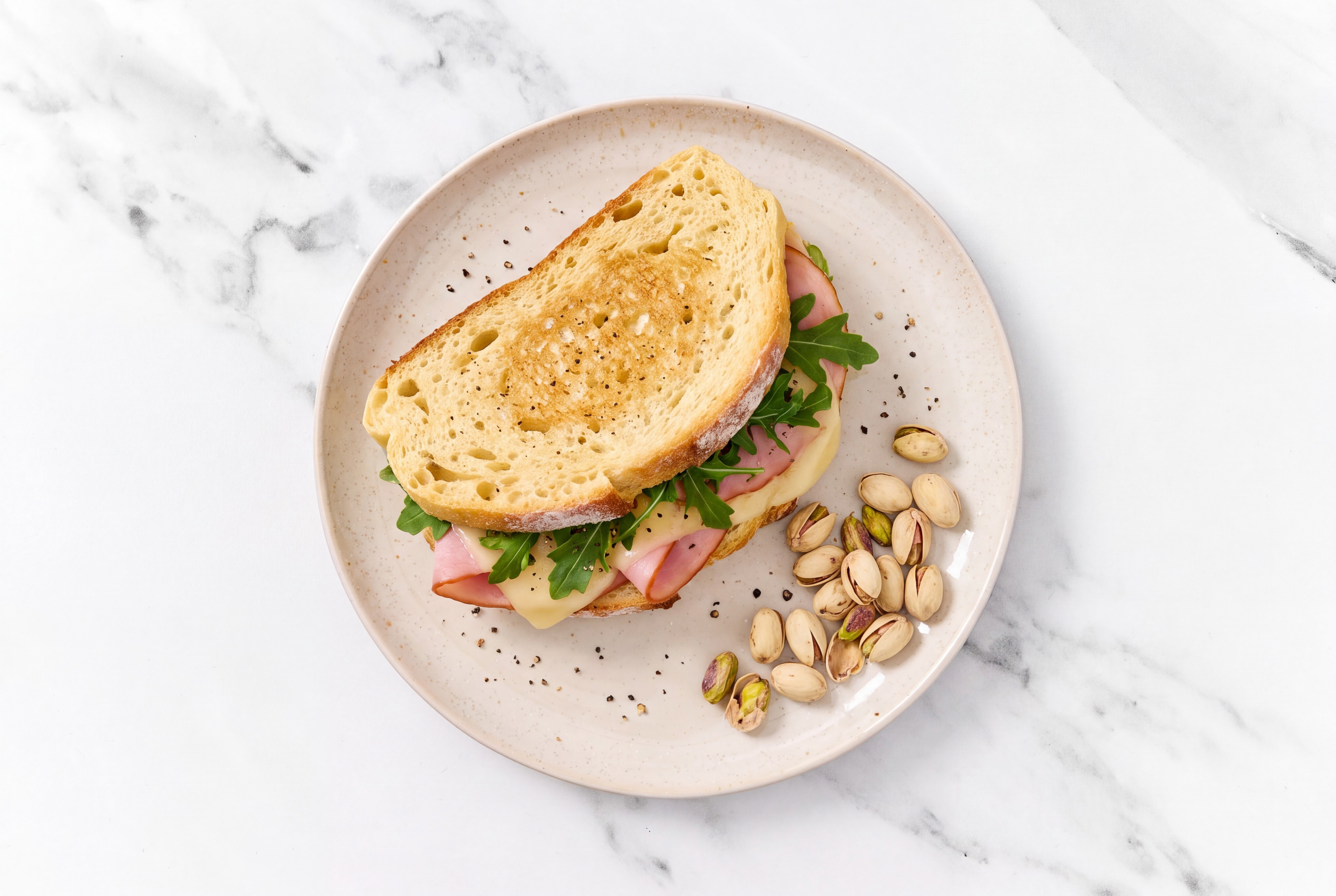 Honey Ham Sourdough Sandwich with Gouda + Salt & Pepper Pistachios