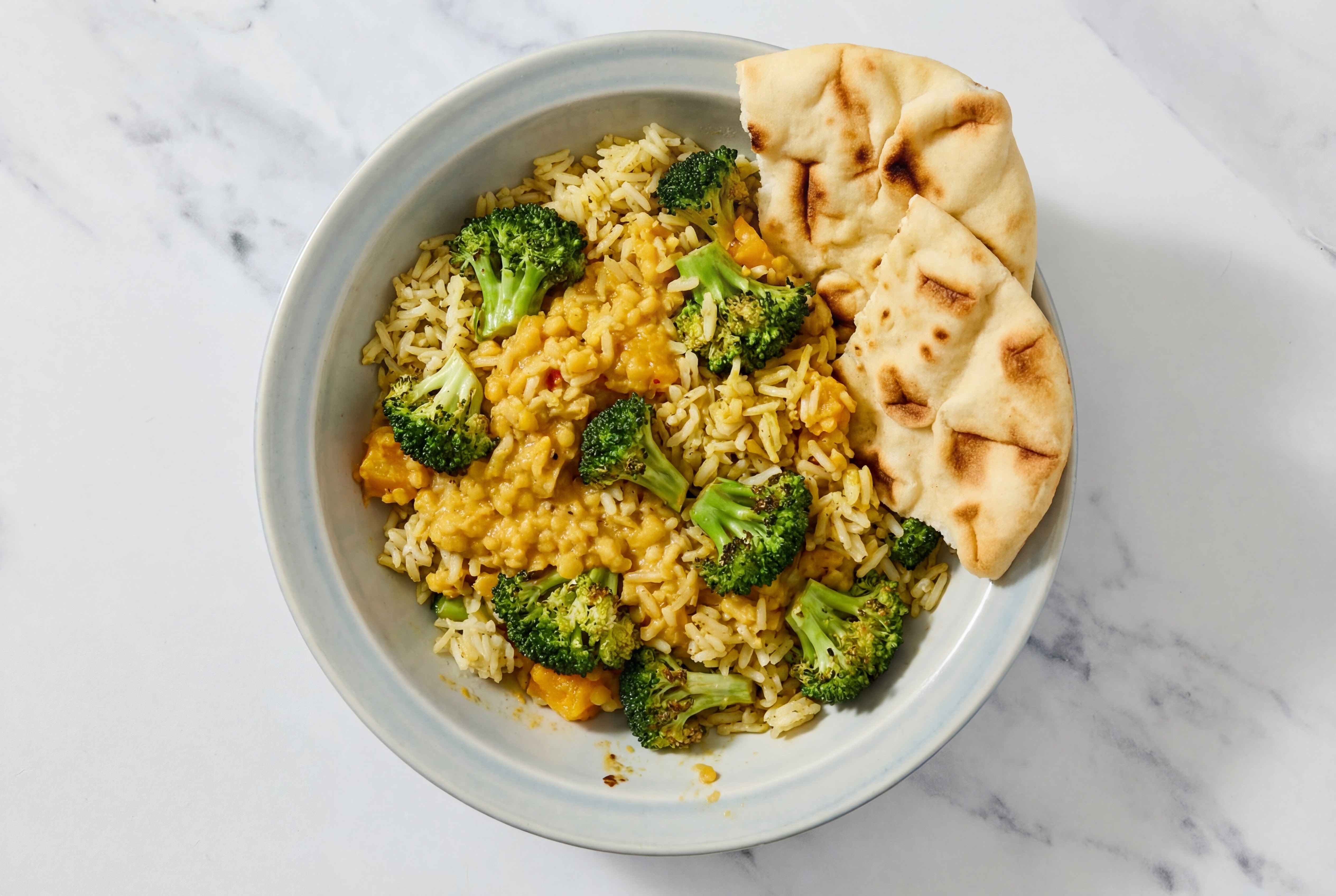 Broccoli Bunches + Red Lentil Dal Grain Bowl with Naan