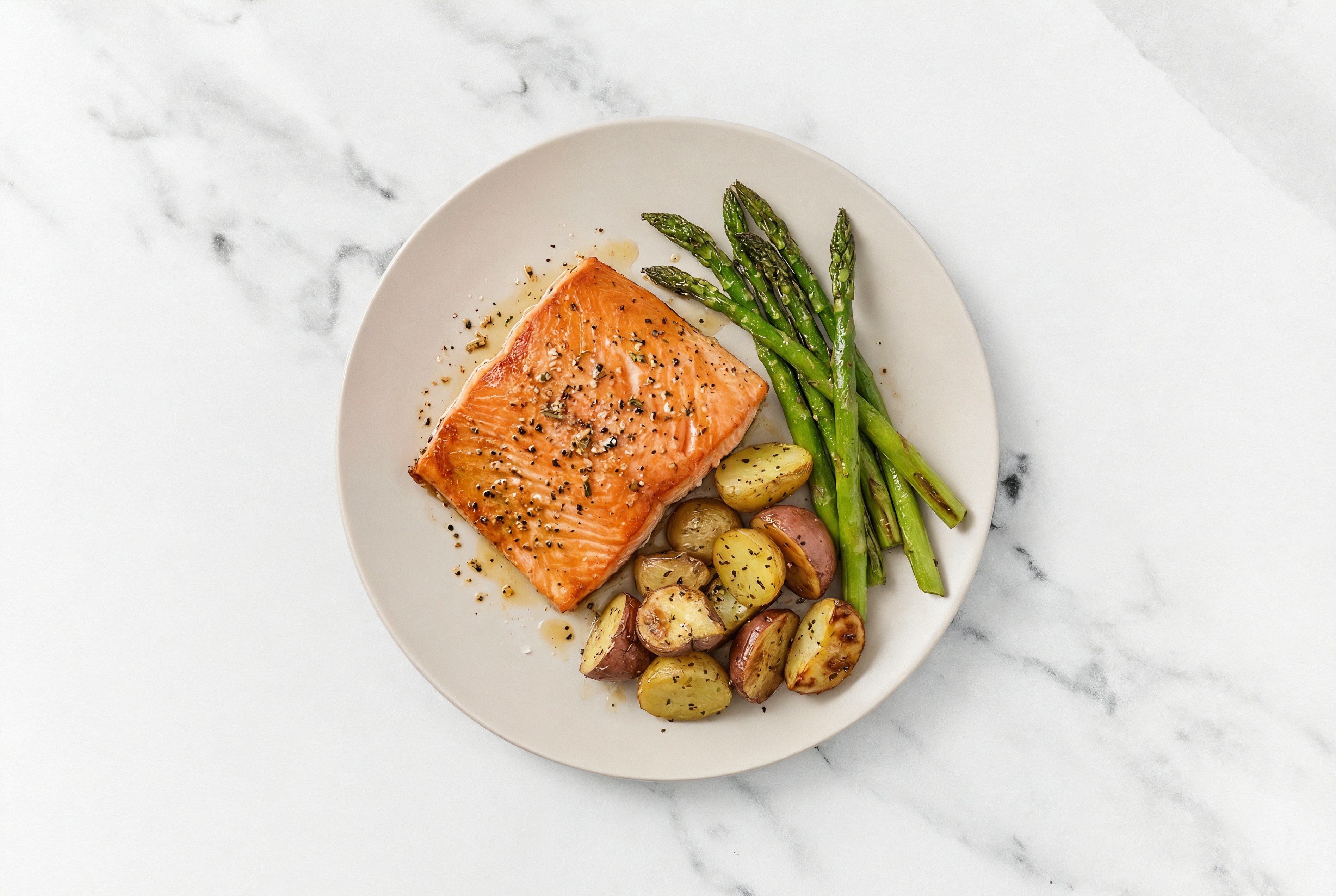 Oven Roasted Wild Salmon with Garlicky Potatoes + Asparagus