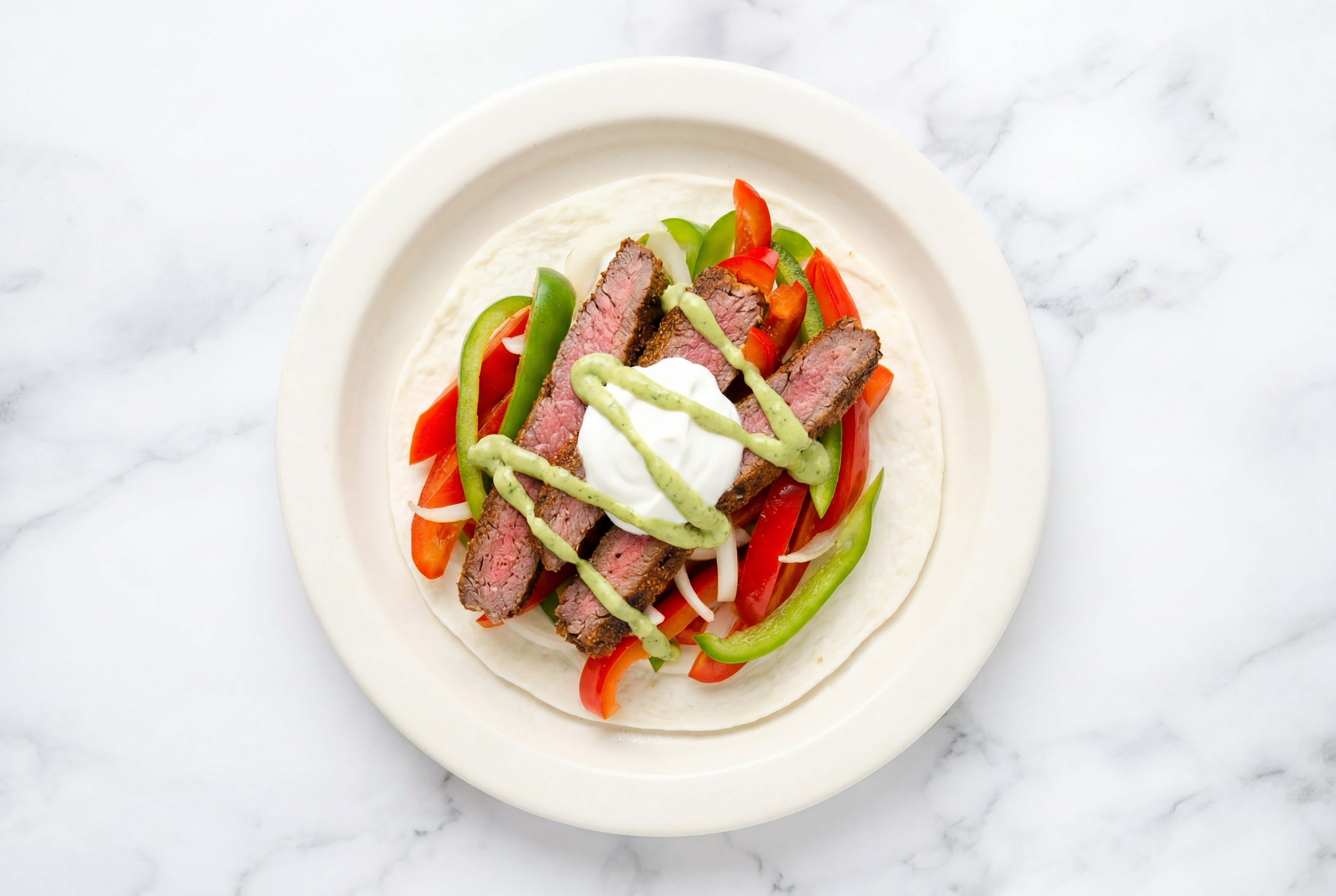 Low-Carb  Rosemary Garlic Beef Flank Steak Fajitas