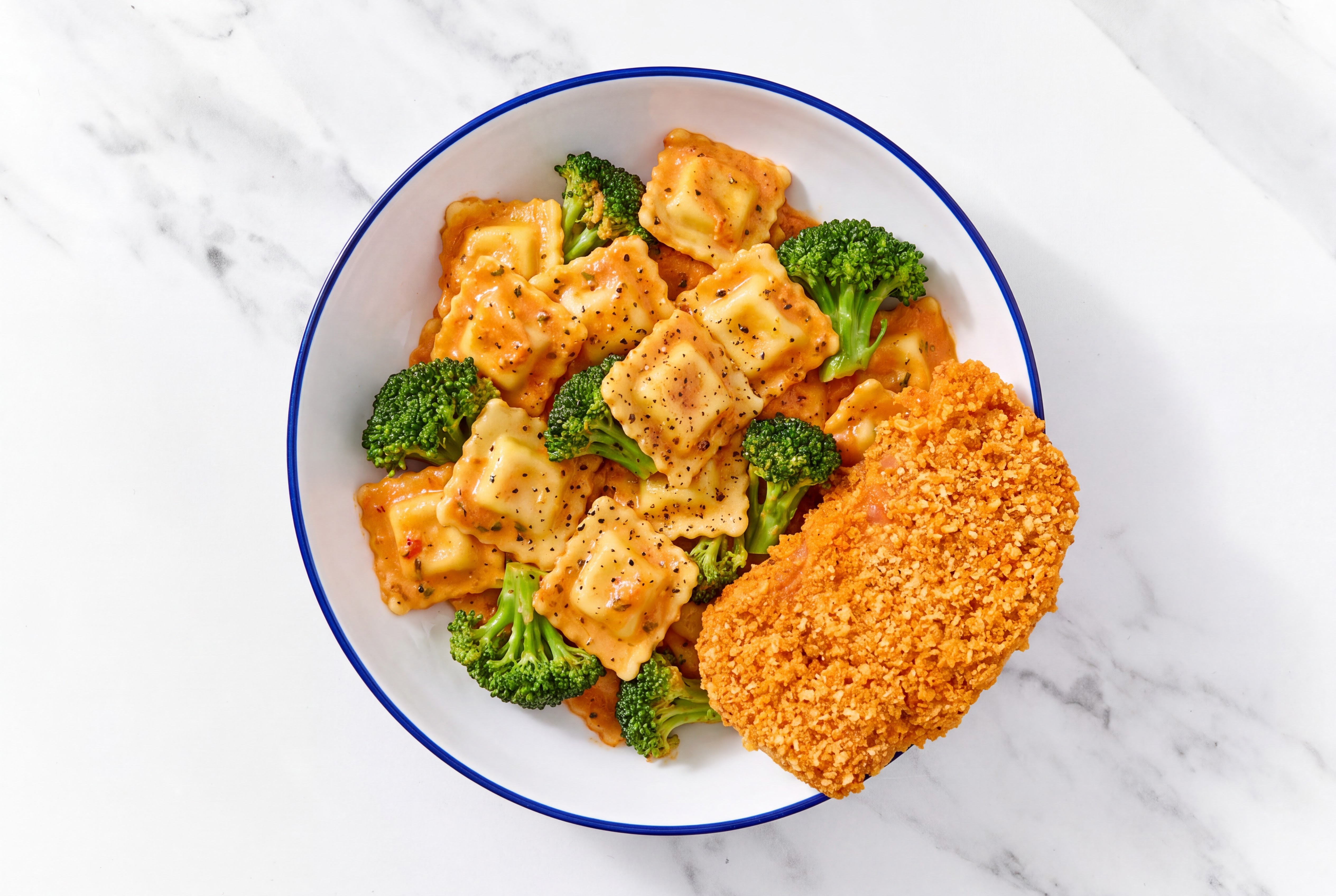 Crispy Hot Honey Chicken over Creamy Vodka Ravioli with Broccoli