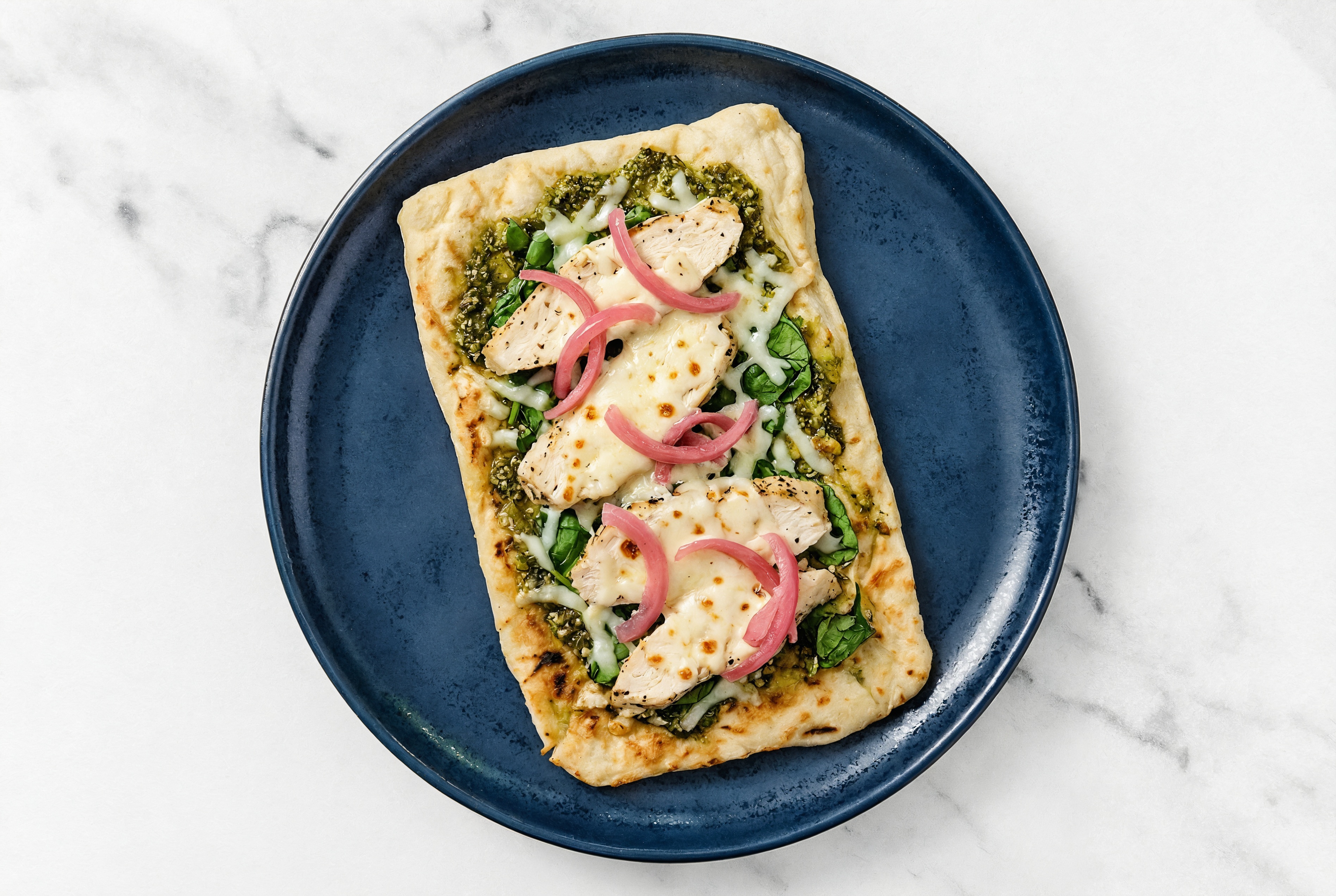 Pesto Grilled Chicken + Spinach Pizza with Pickled Onion