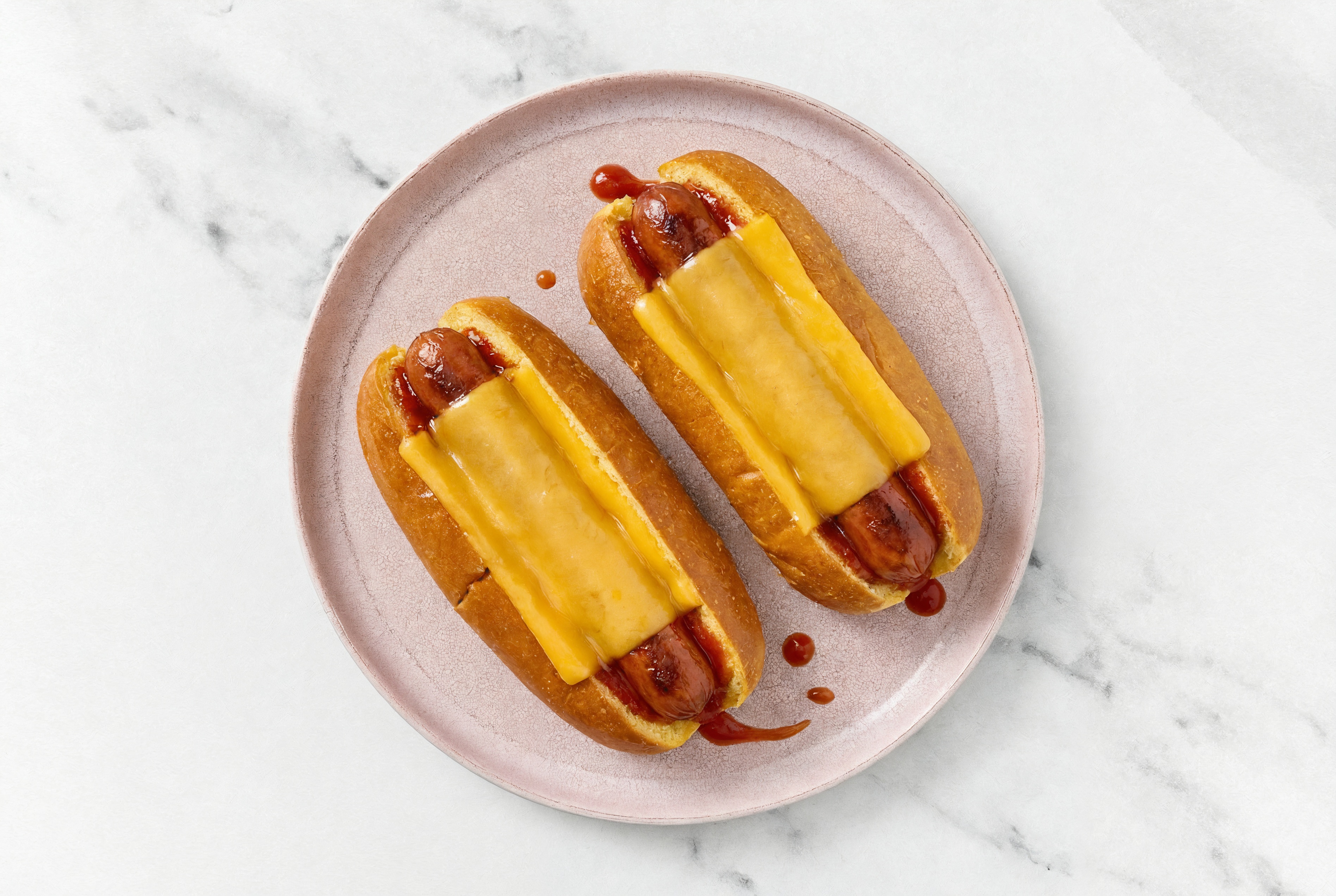 Cheddar Beef Hot Dog with Ketchup on Brioche