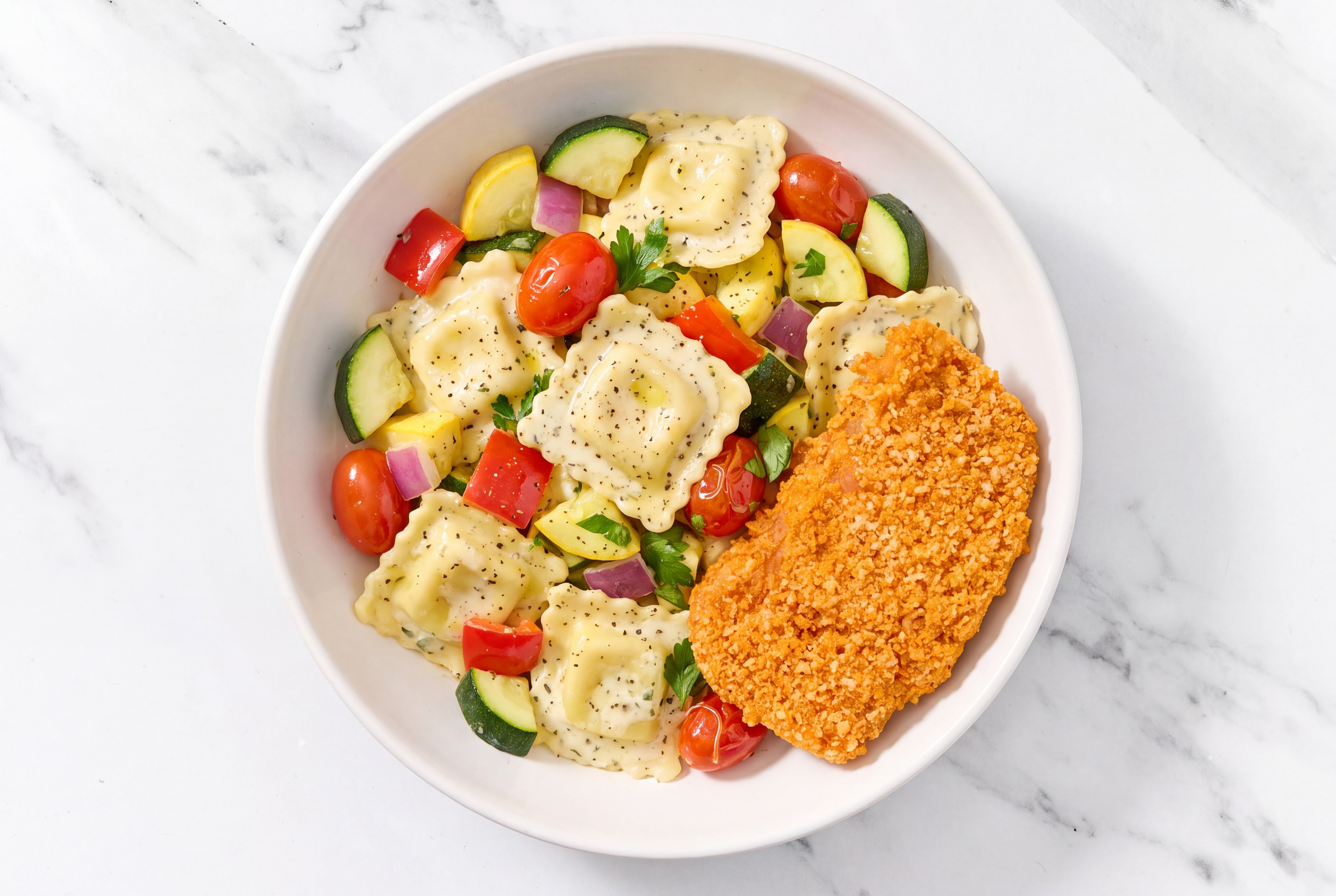 Crispy Hot Honey Chicken over Creamy Ravioli with Mixed Veggies