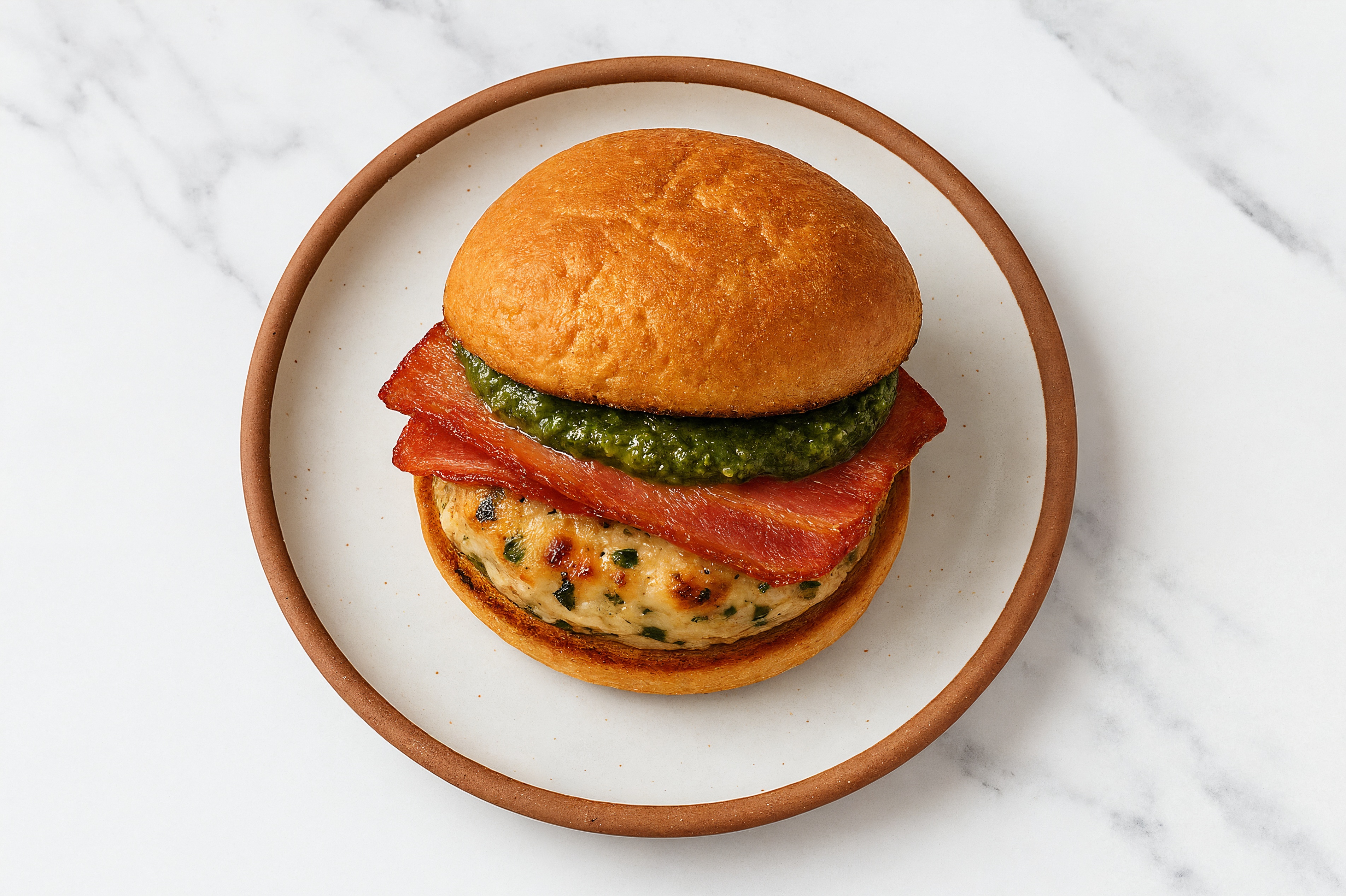 Garlic Chicken Burger on Gluten-Free Bun with Pesto & Turkey Bacon