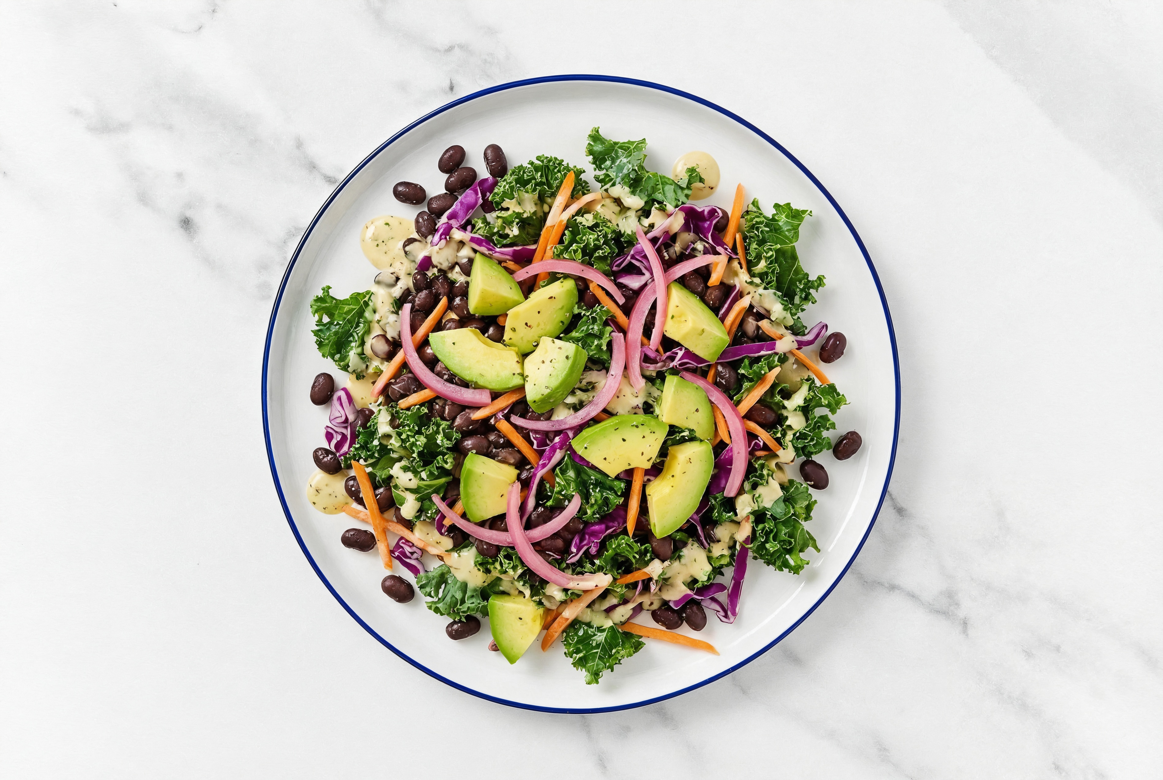 Rainbow Veggie Caesar with Black Beans, Pickled Onions + Avocado