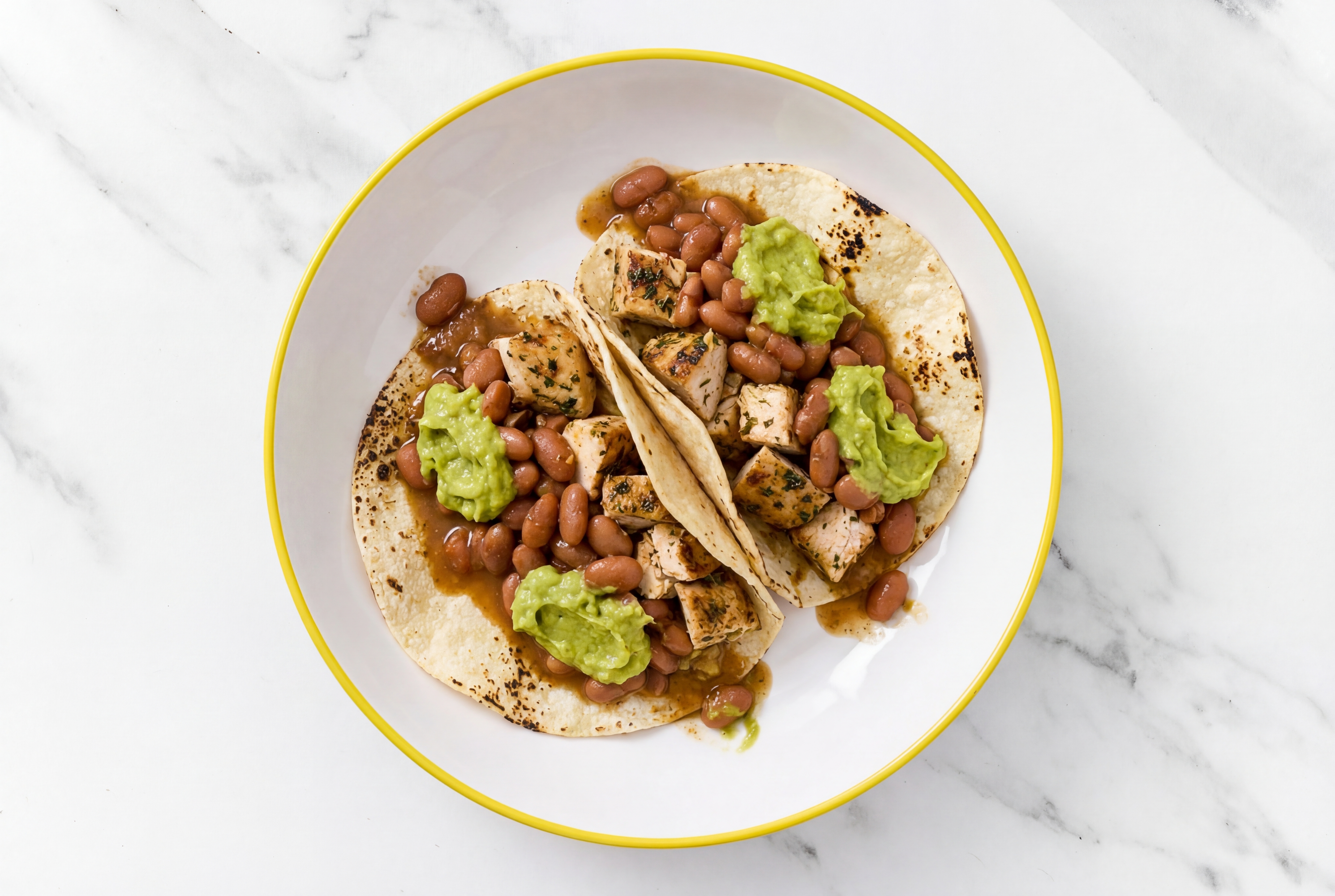 Hearty Garlic Chicken Tacos with Guacamole & Pinto Beans