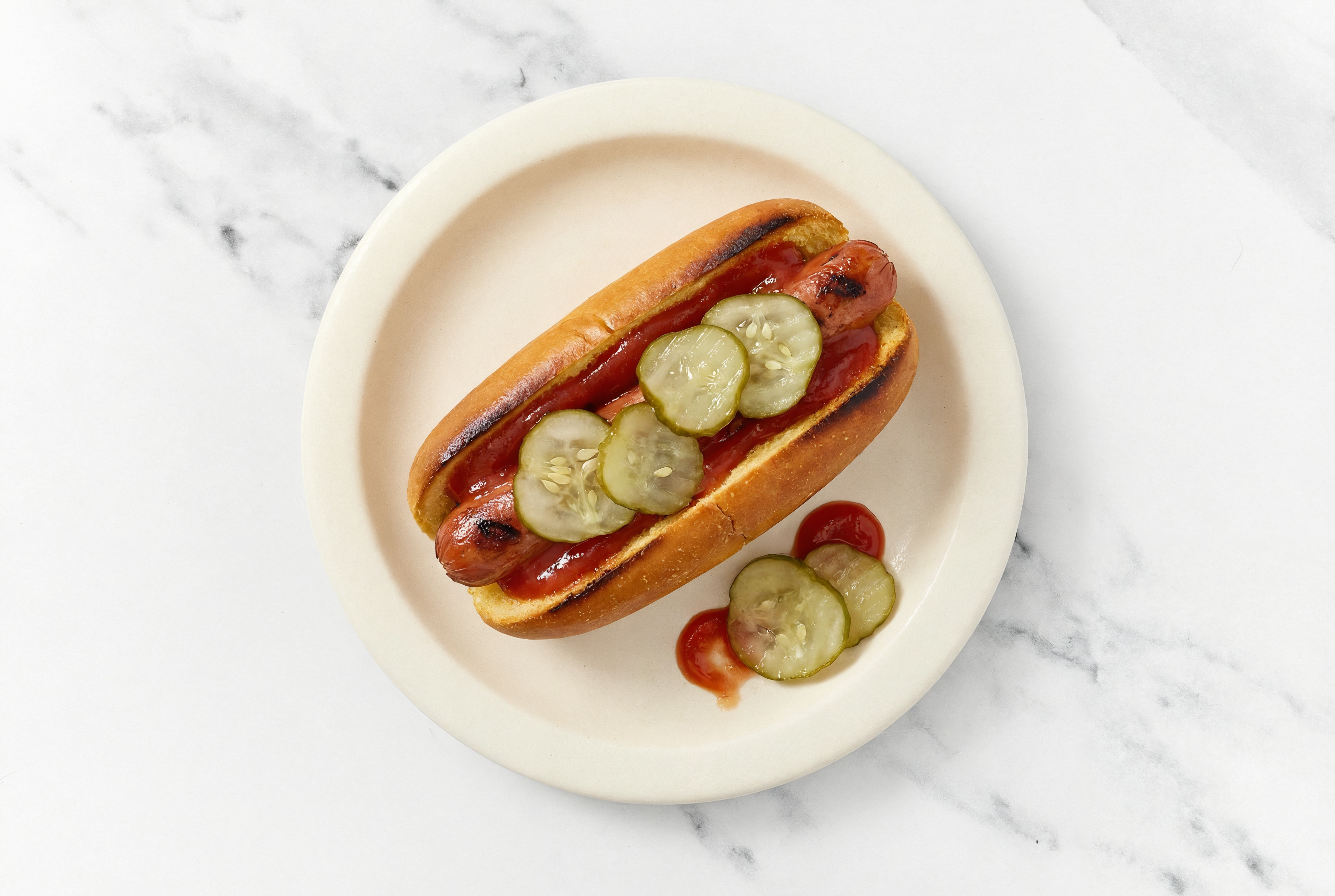 Pickle Beef Hot Dog with Ketchup on Brioche