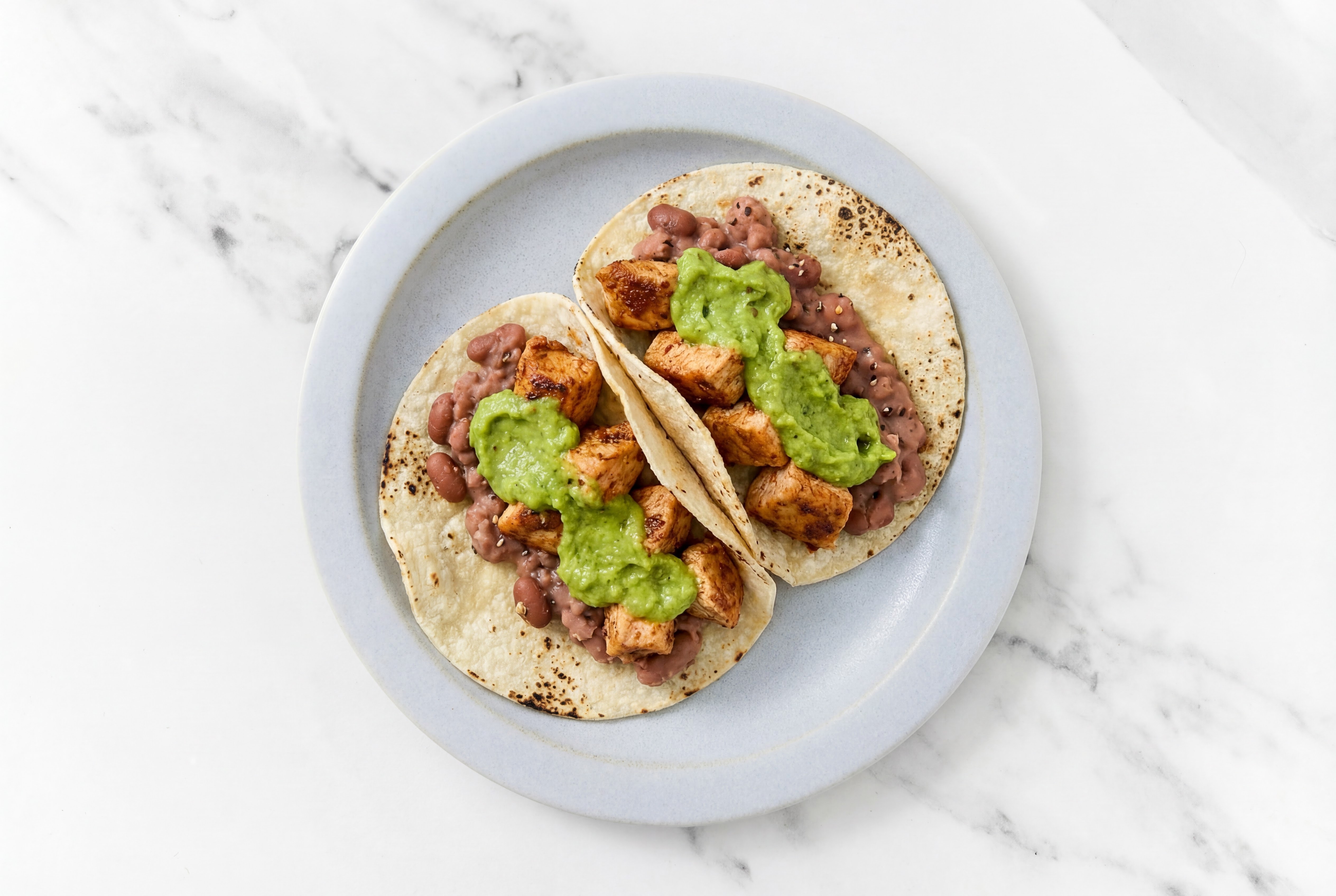 Hearty Chipotle Chicken Tacos with Avocado & Refried Red Beans