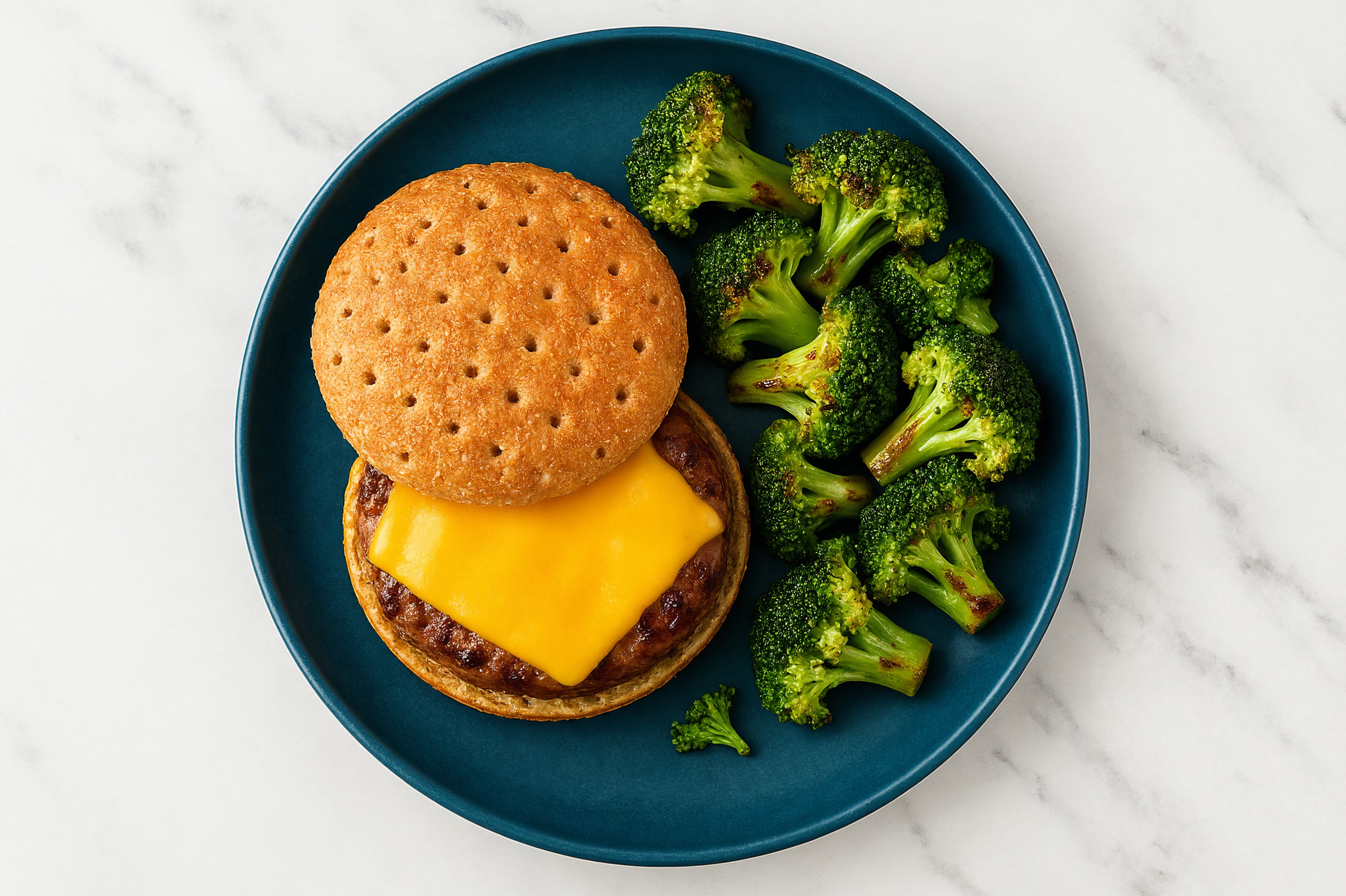 Classic Cheesy Veggie Burger on Multigrain Bun with Ground Beef Patties