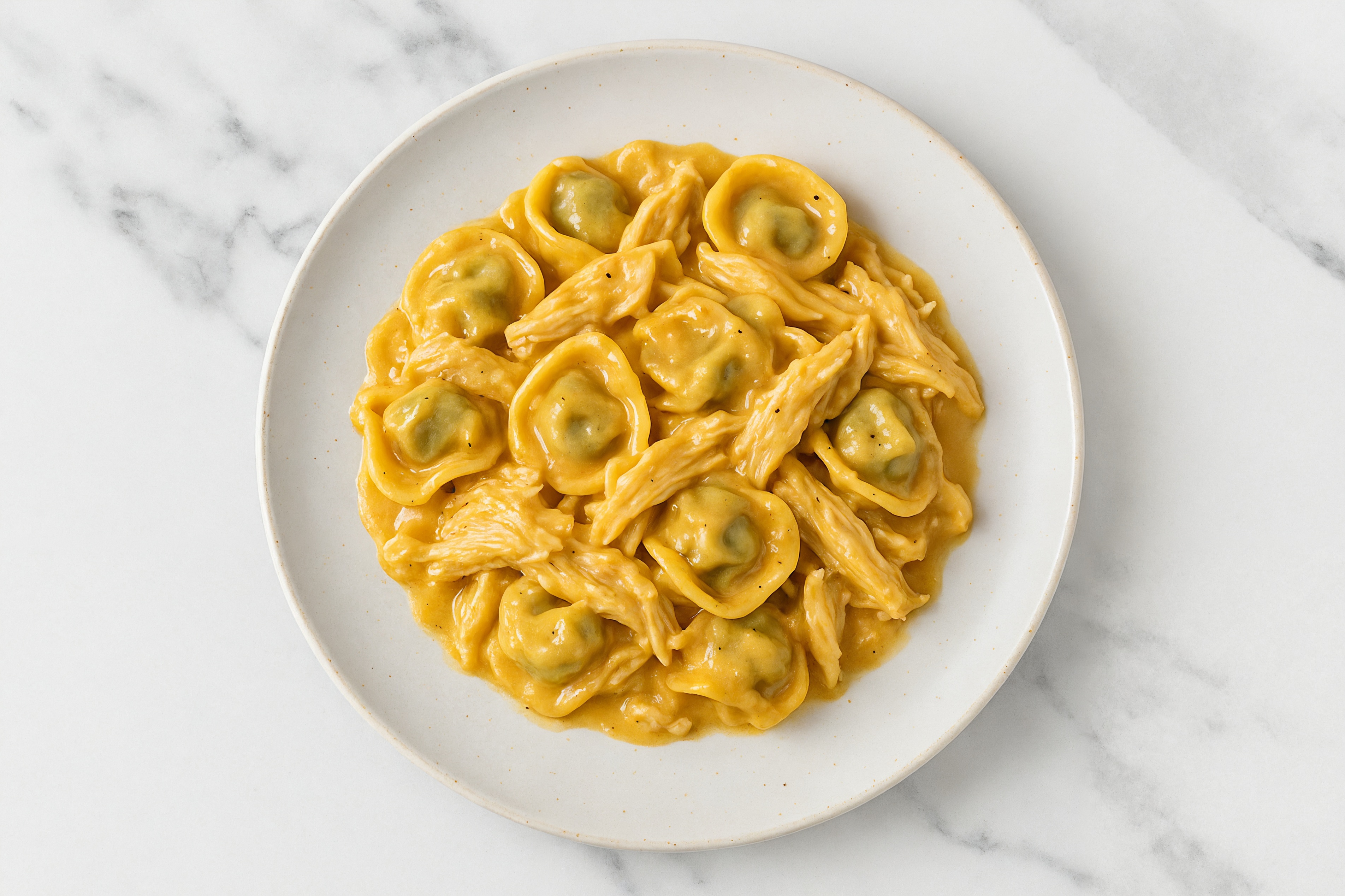 Creamy Cheddar Tortellini with Pulled Chicken