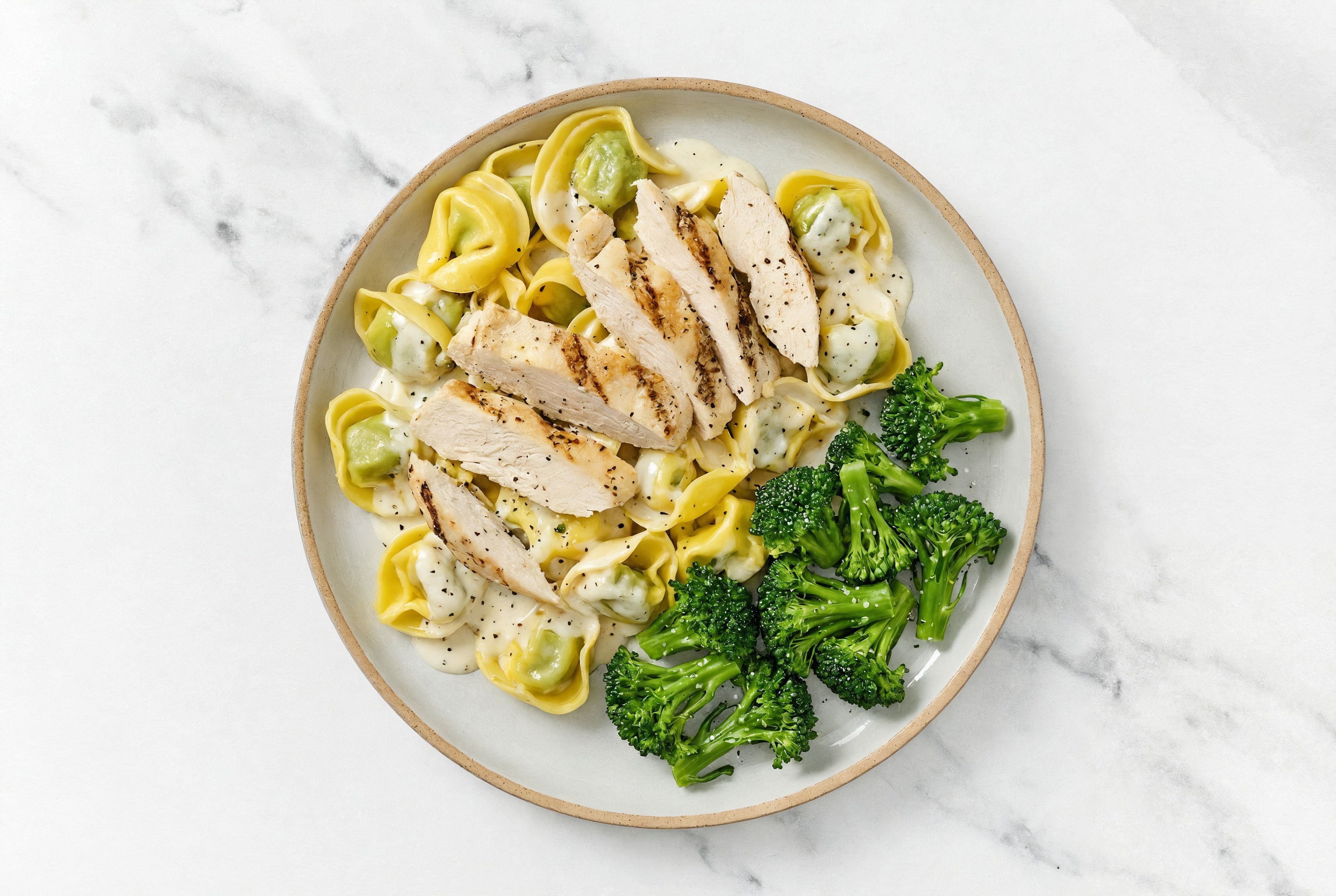 Hearty Alfredo Tortellini with Seasoned Chicken & Baby Broccoli