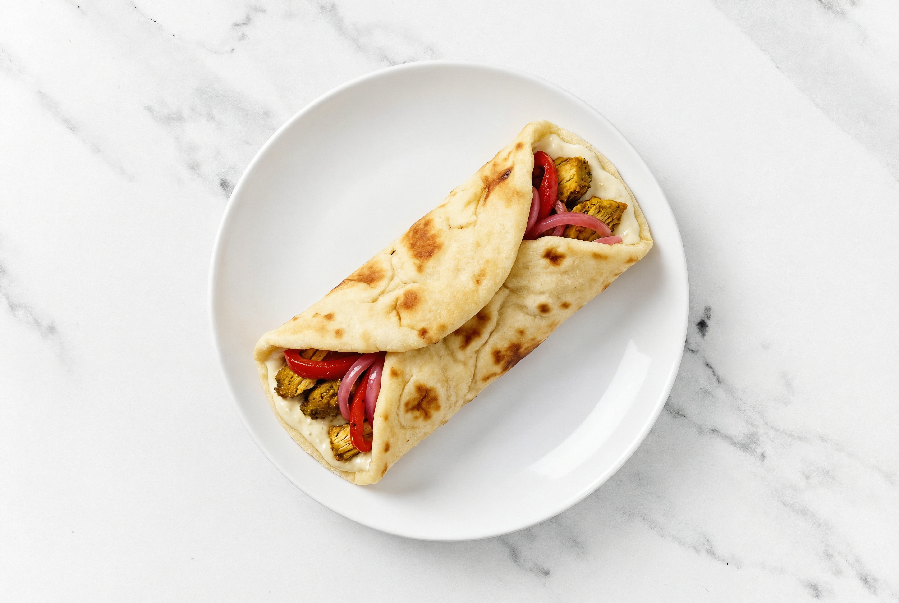 Shawarma Chicken Wrap with Garlic Sauce + Pickled Onions