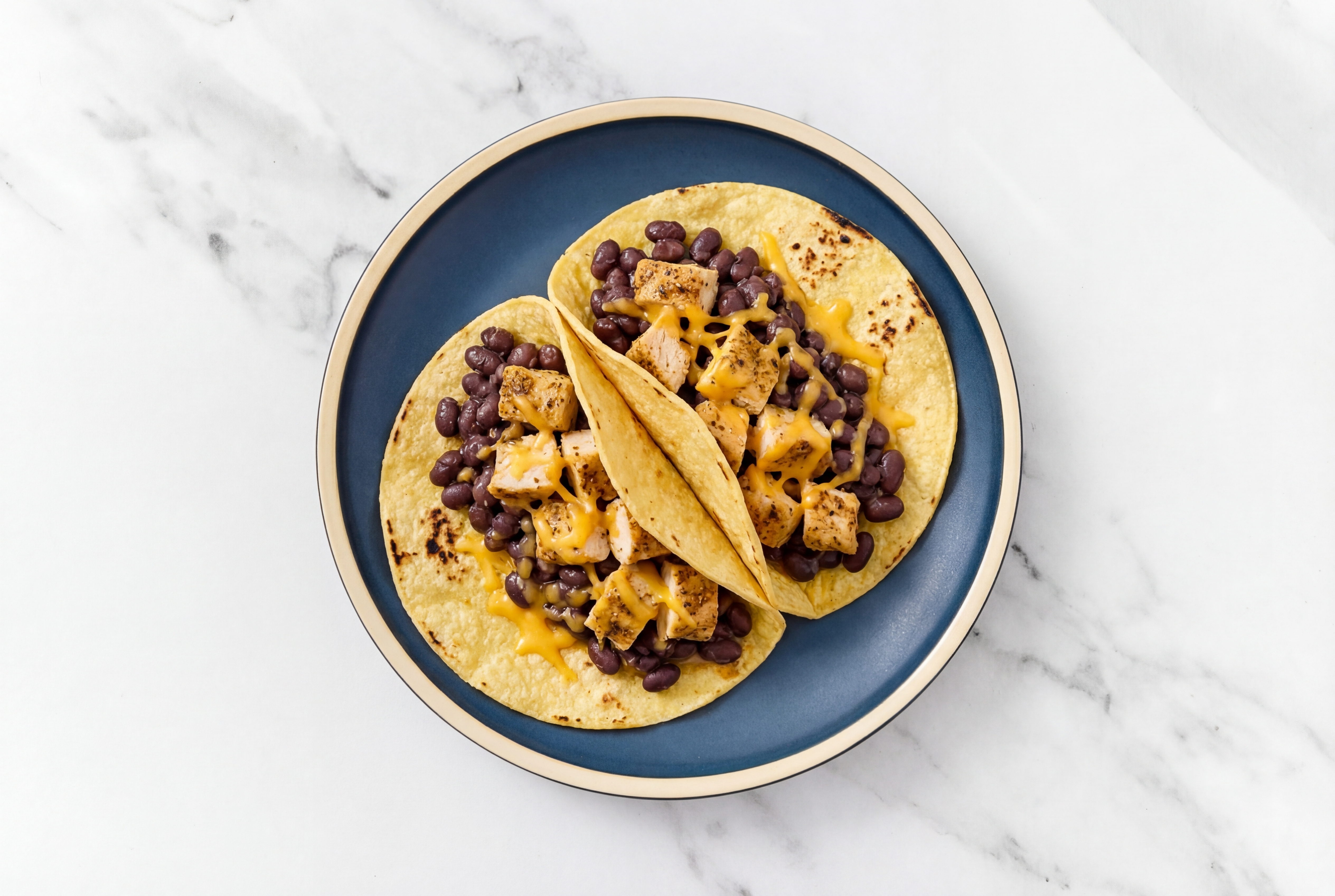 Herby Garlic Chicken Tacos with Cheddar Cheese & Spiced Beans
