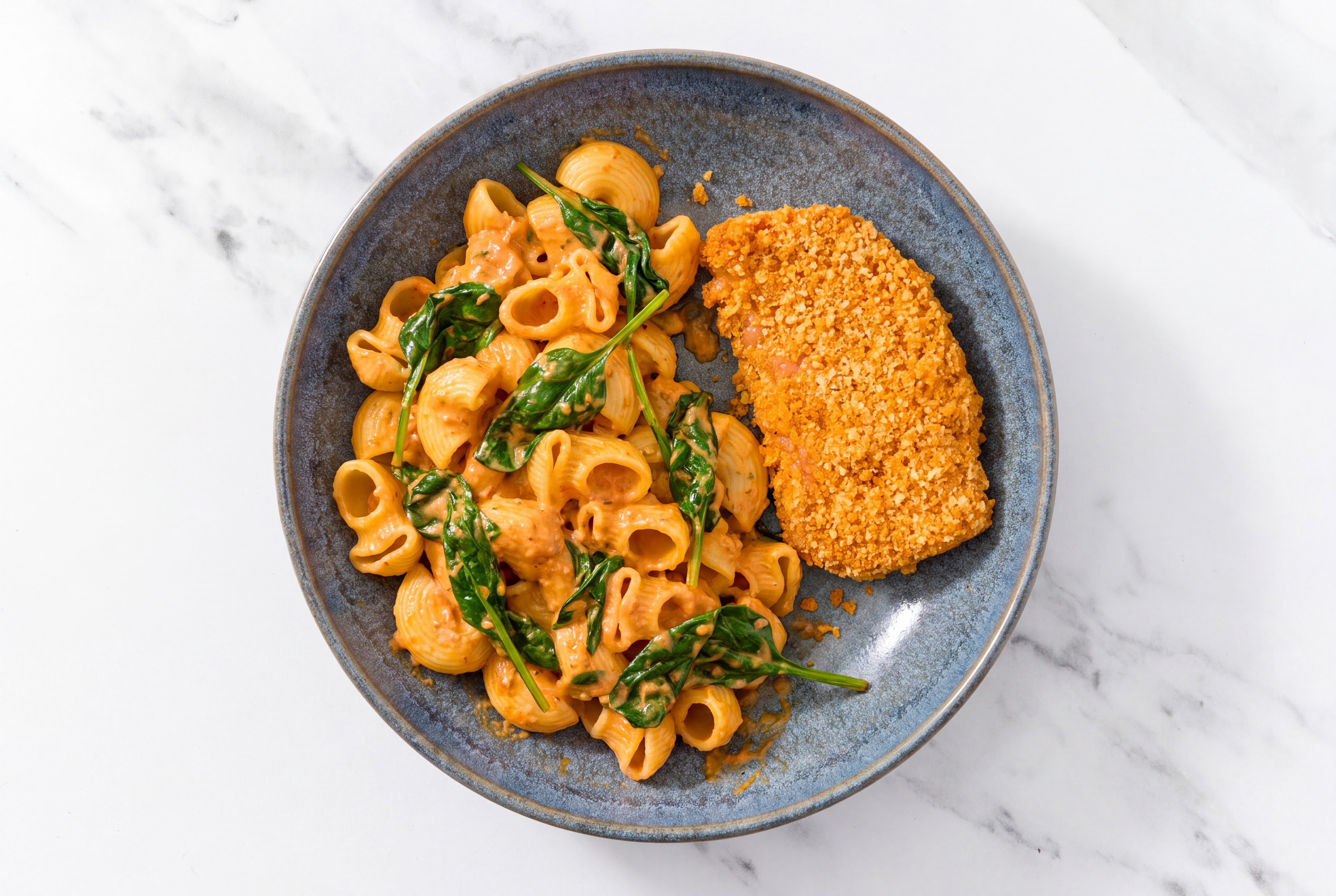 Crispy Hot Honey Chicken over Creamy Vodka Chiocciole Pasta with Baby Spinach