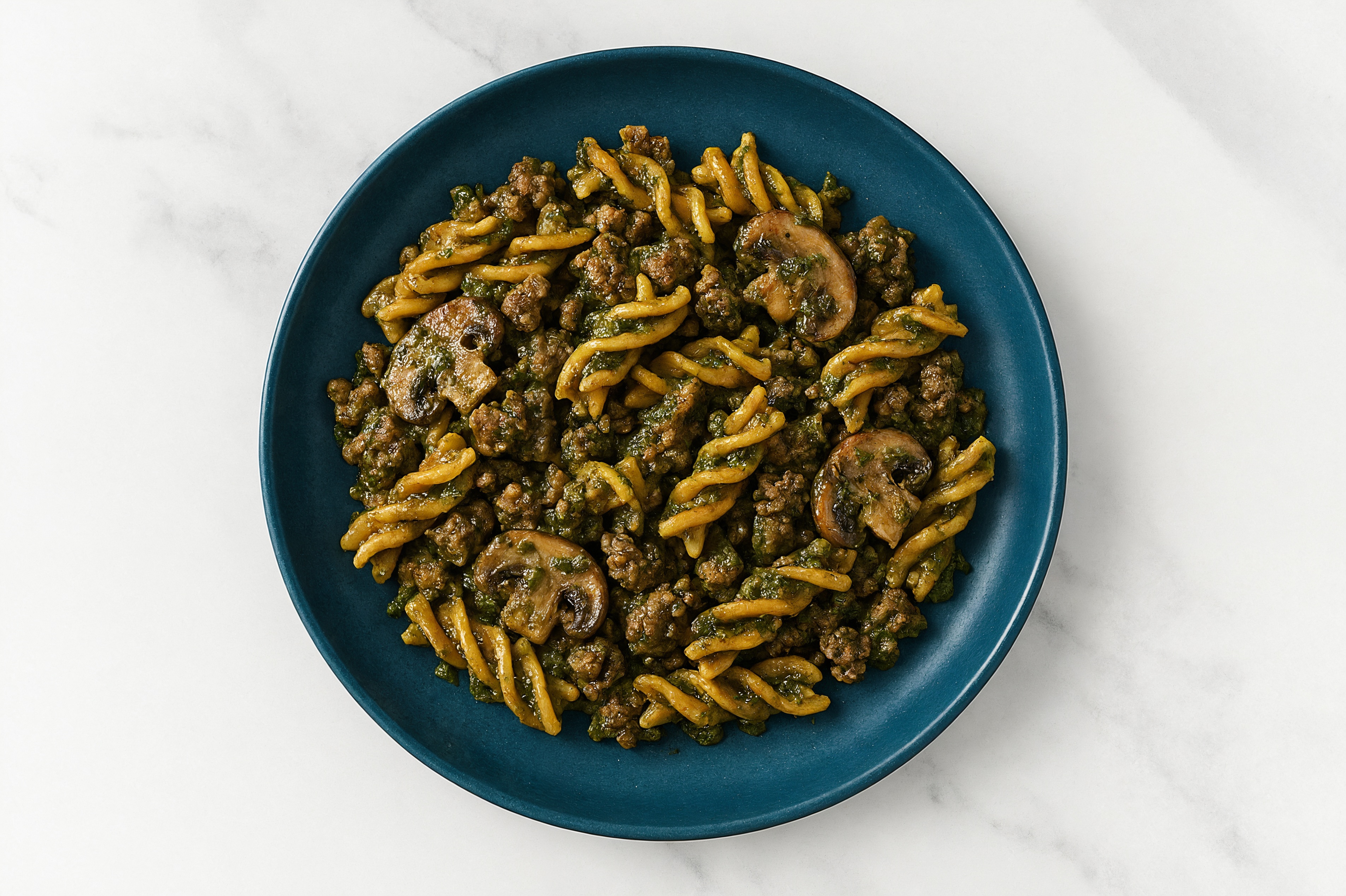 Lentil Fusilli Kale Pesto with Ground Lamb & Mushrooms