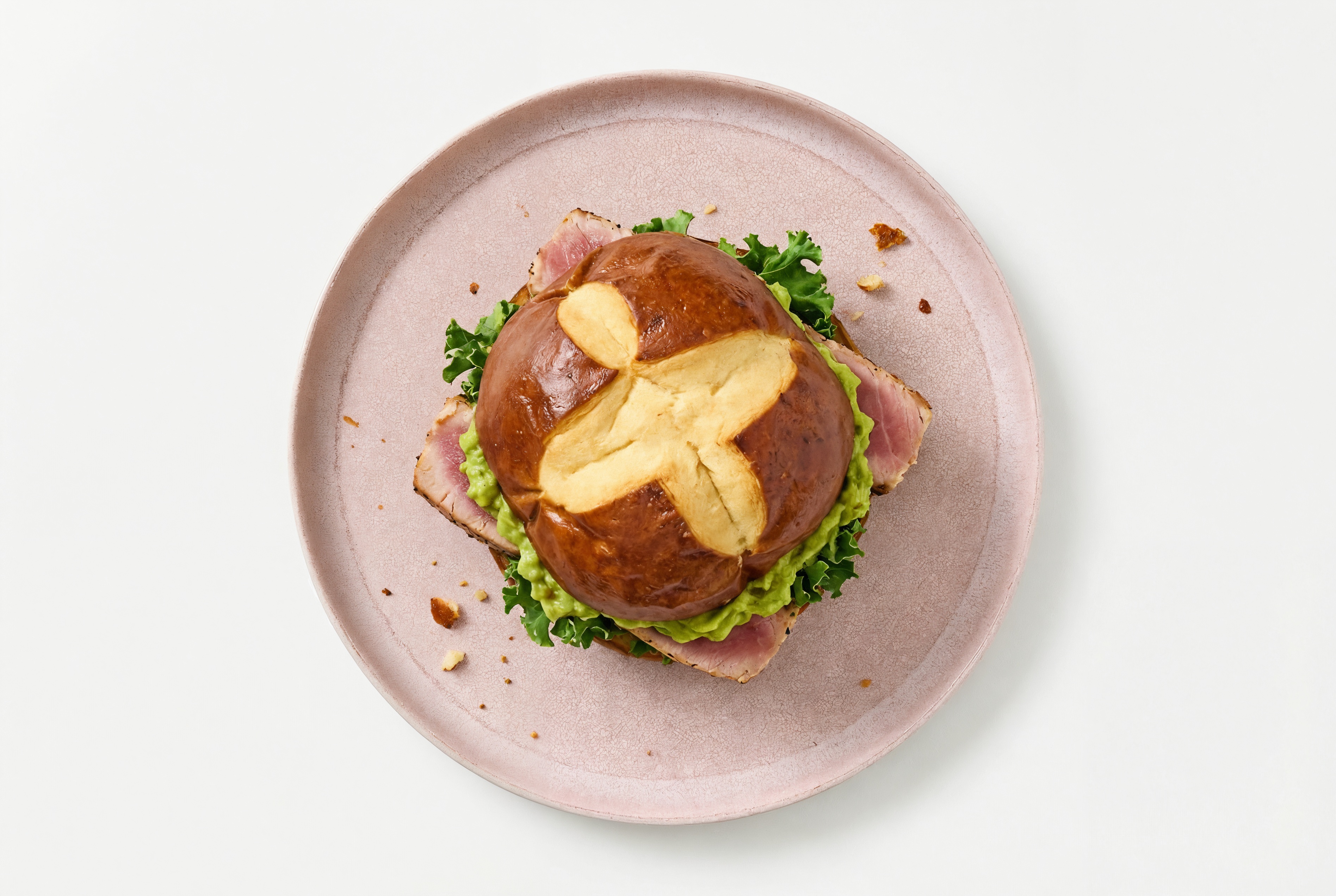 Guac' Tuna Sandwich on Pretzel Bun with Kale