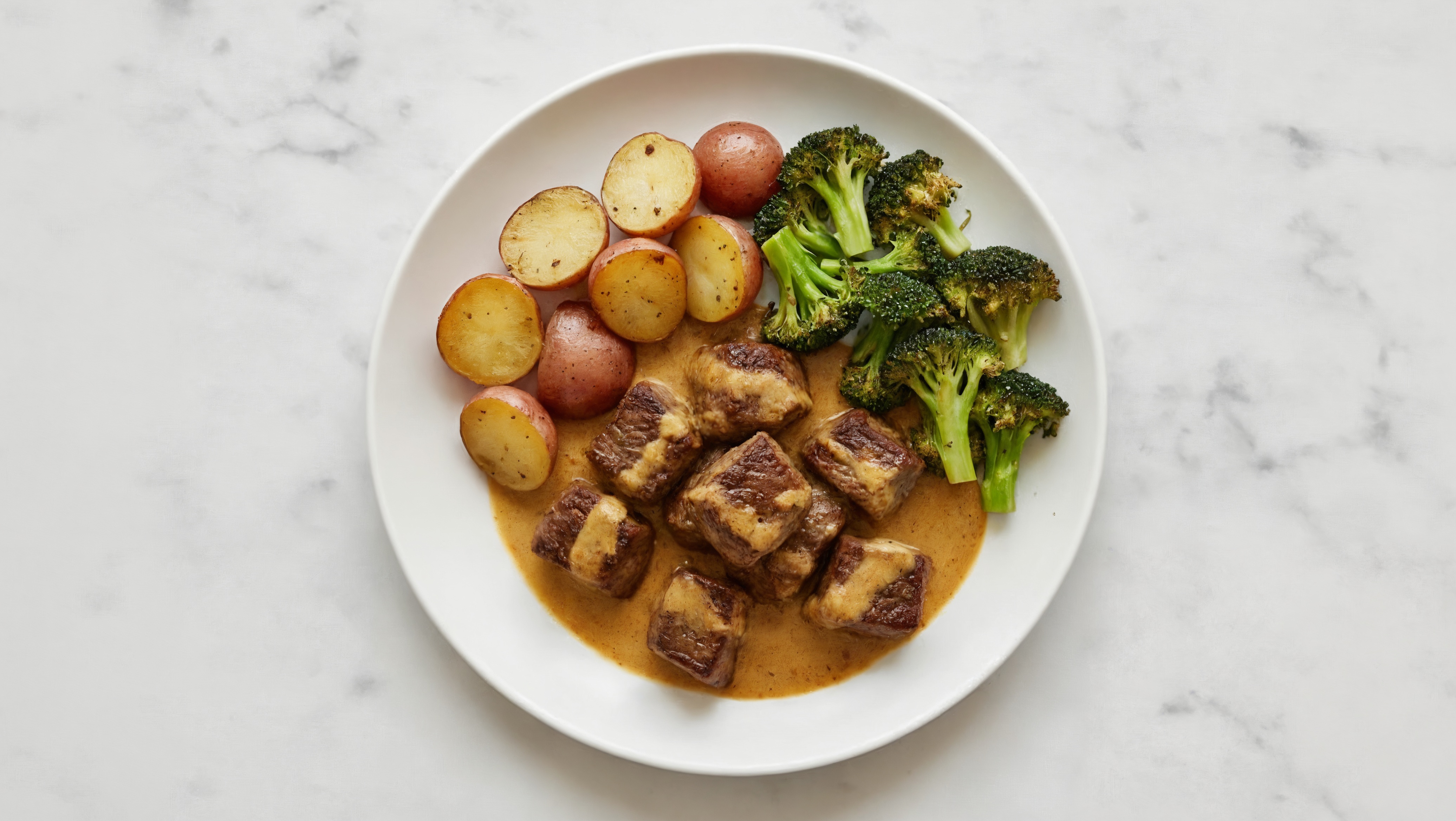 Curry Seared Lamb with Red Potatoes & Organic Broccoli