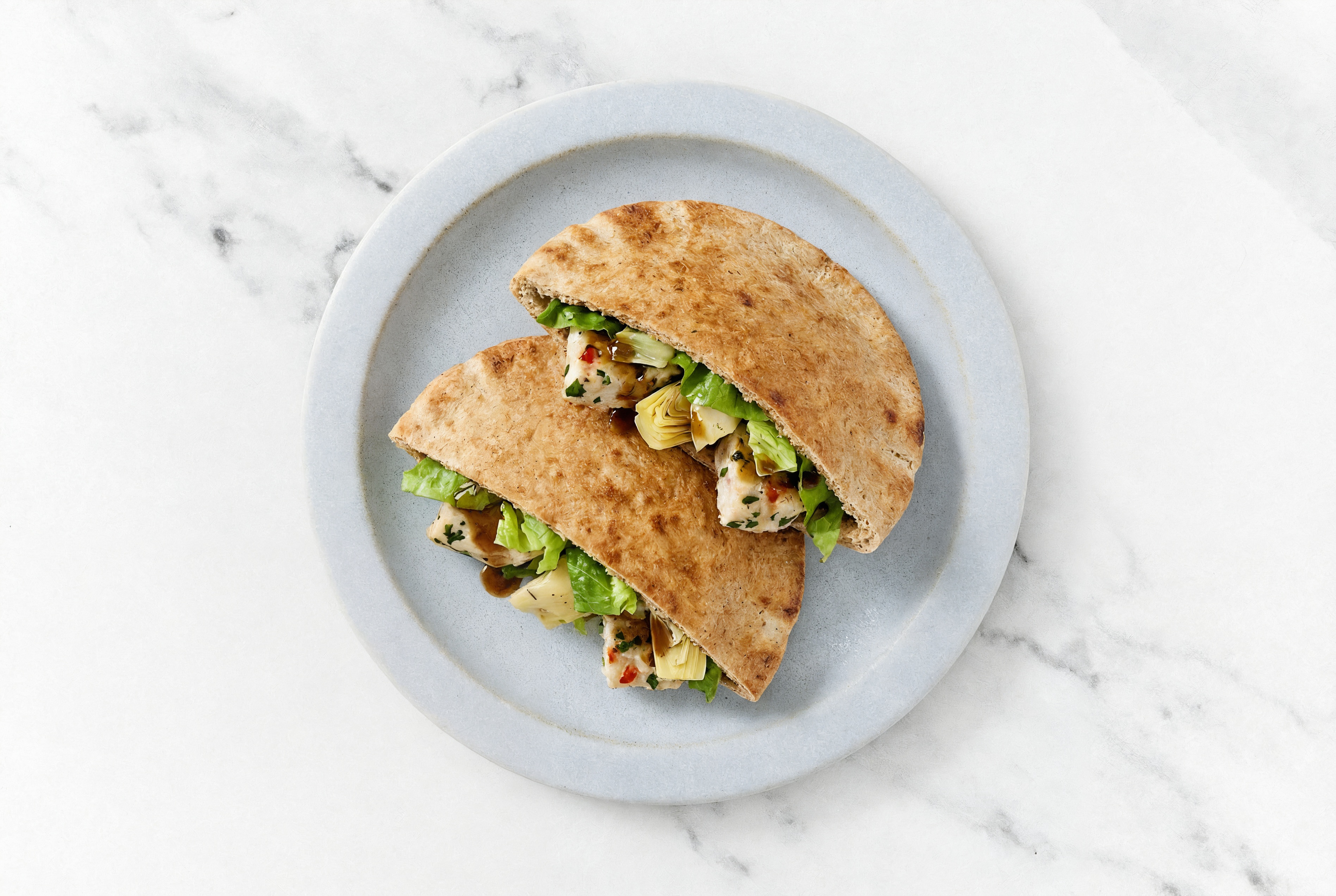 Tangy Bruschetta Chicken + Artichoke Whole Grain Pita Pockets