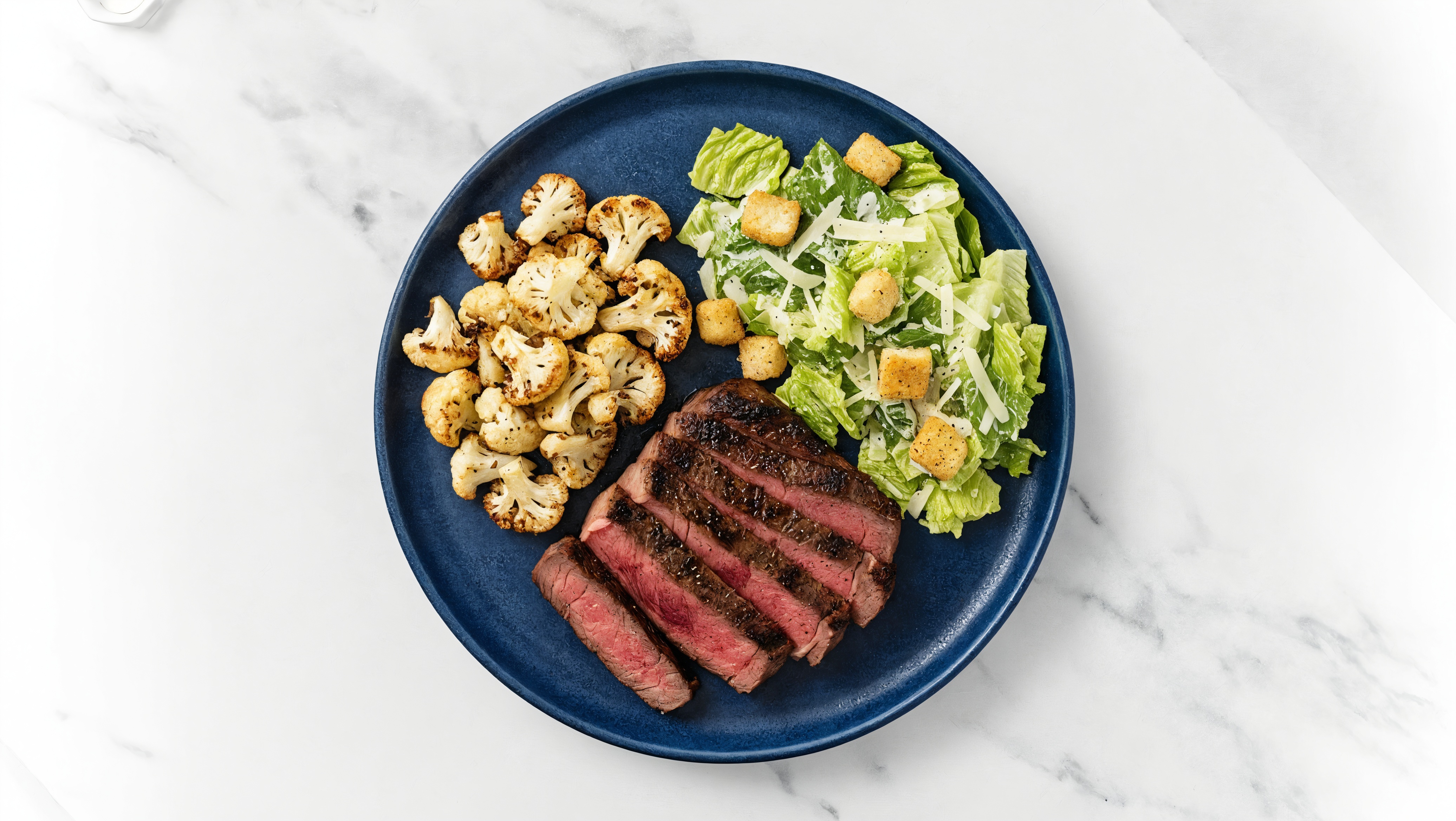 Wagyu Ribeye Steak + Caesar Salad with Cauliflower Florets