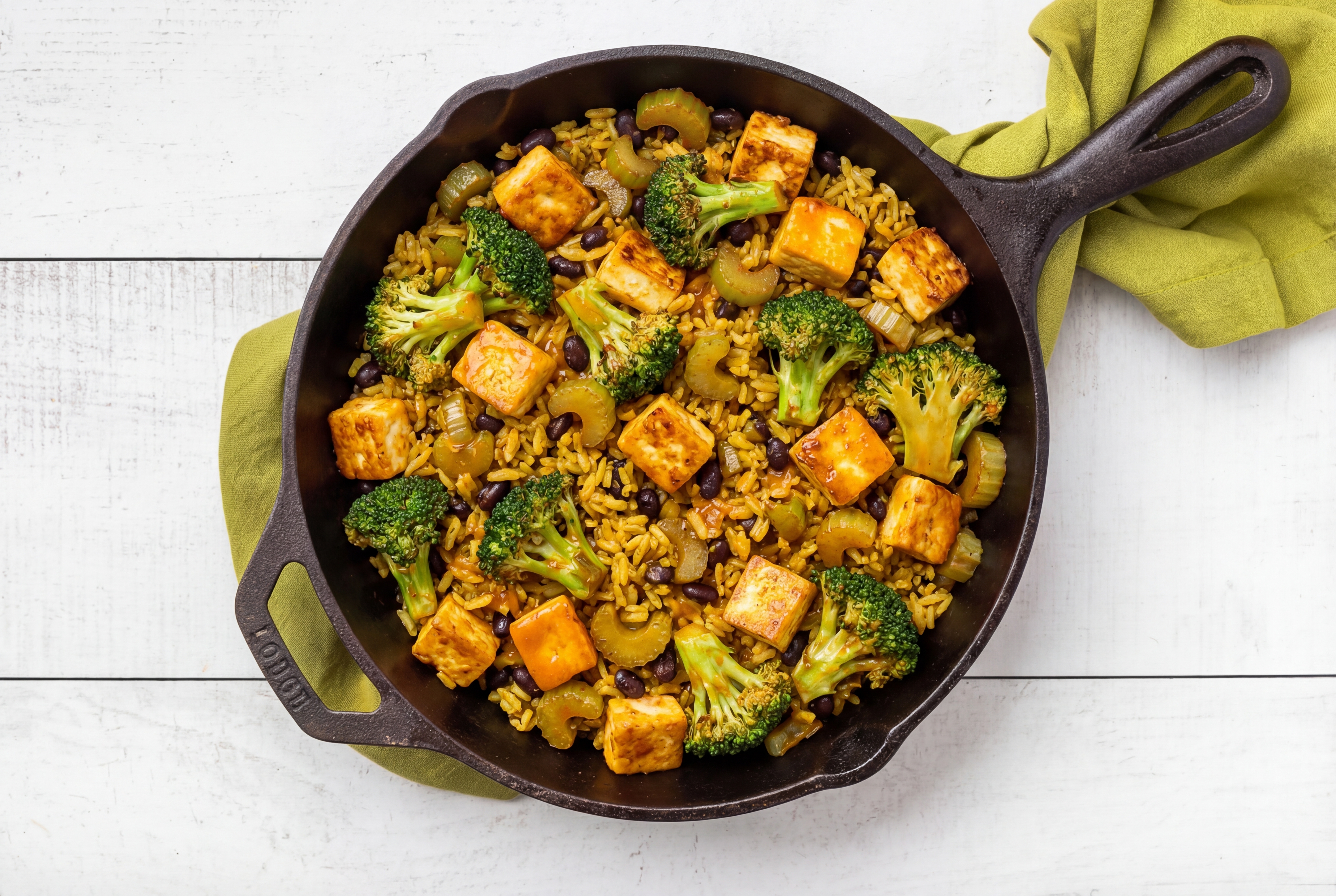 Soft & Creamy Paneer in Peppery Sauce with Organic Broccoli + Celery over Rice with Beans