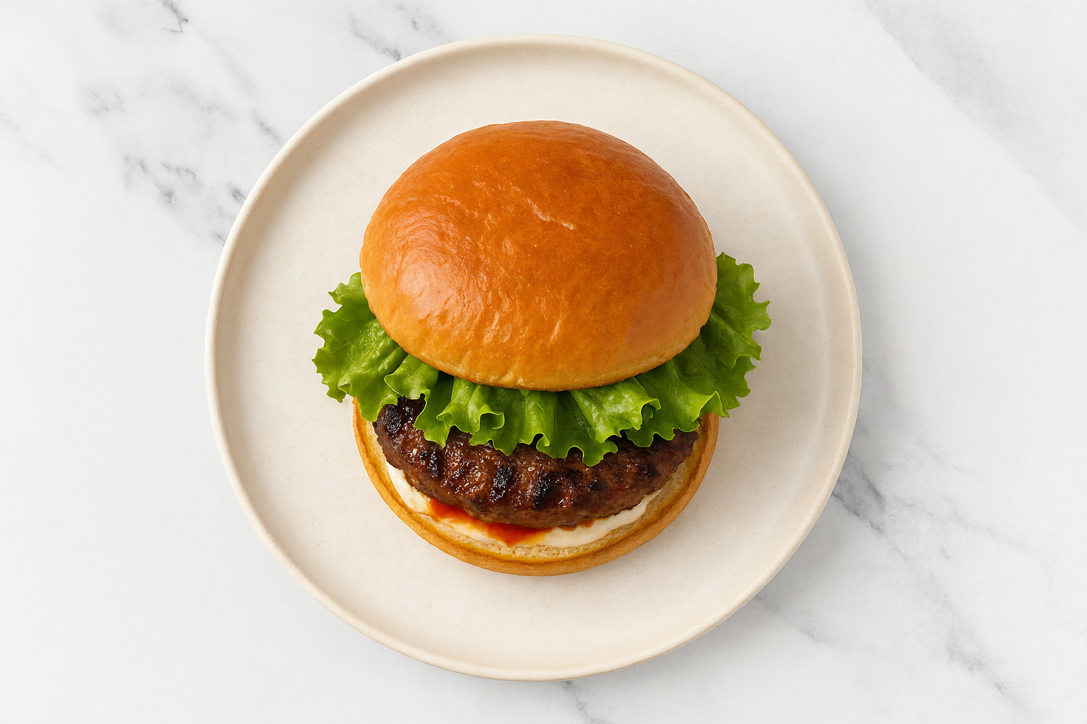 Wagyu Beef Burger on Brioche with Spicy Mayo with Lettuce with Sriracha Hot Sauce