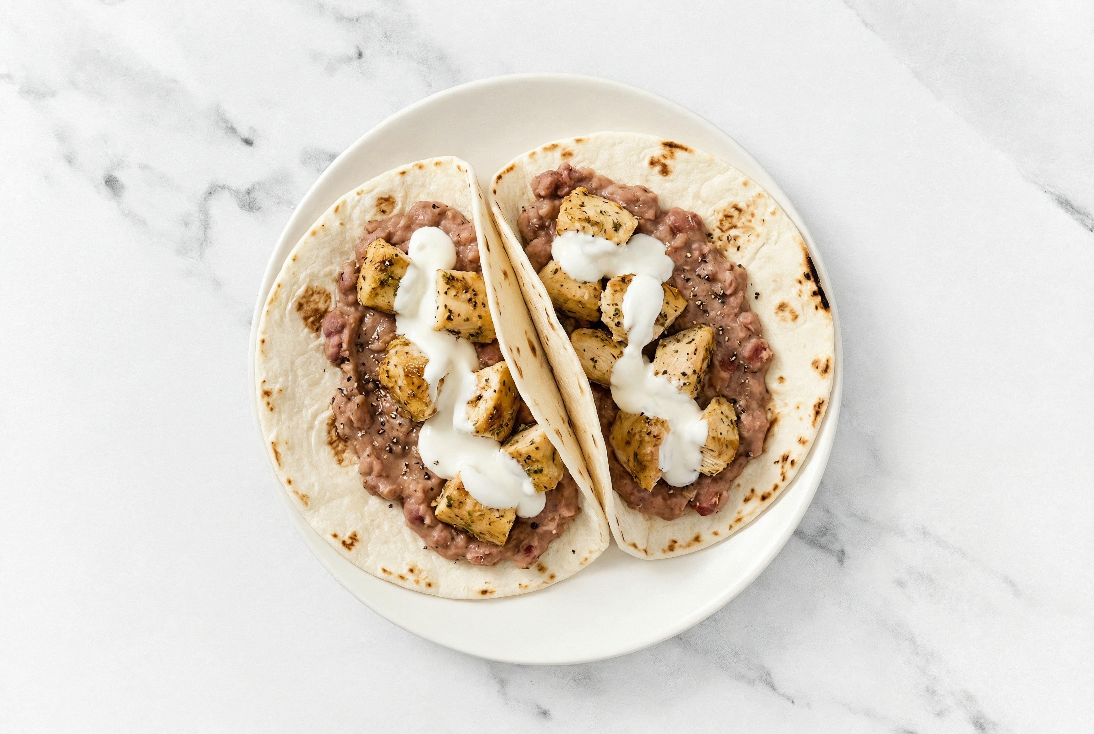  Garlic Chicken Tacos with Crema & Refried Red Beans