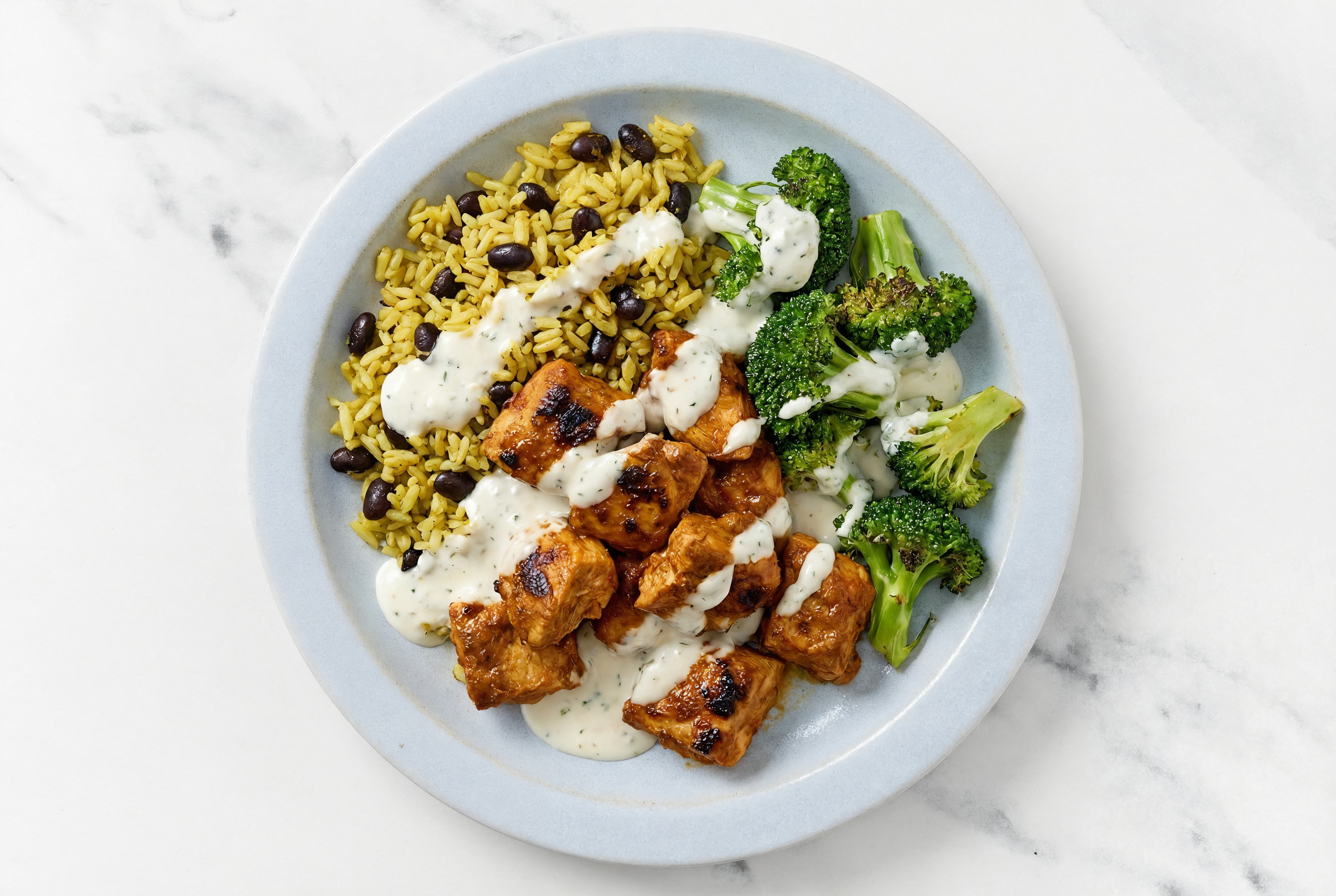 Creamy Garlic Tandoori Chicken Rice with Beans Bowl with Broccoli Florets