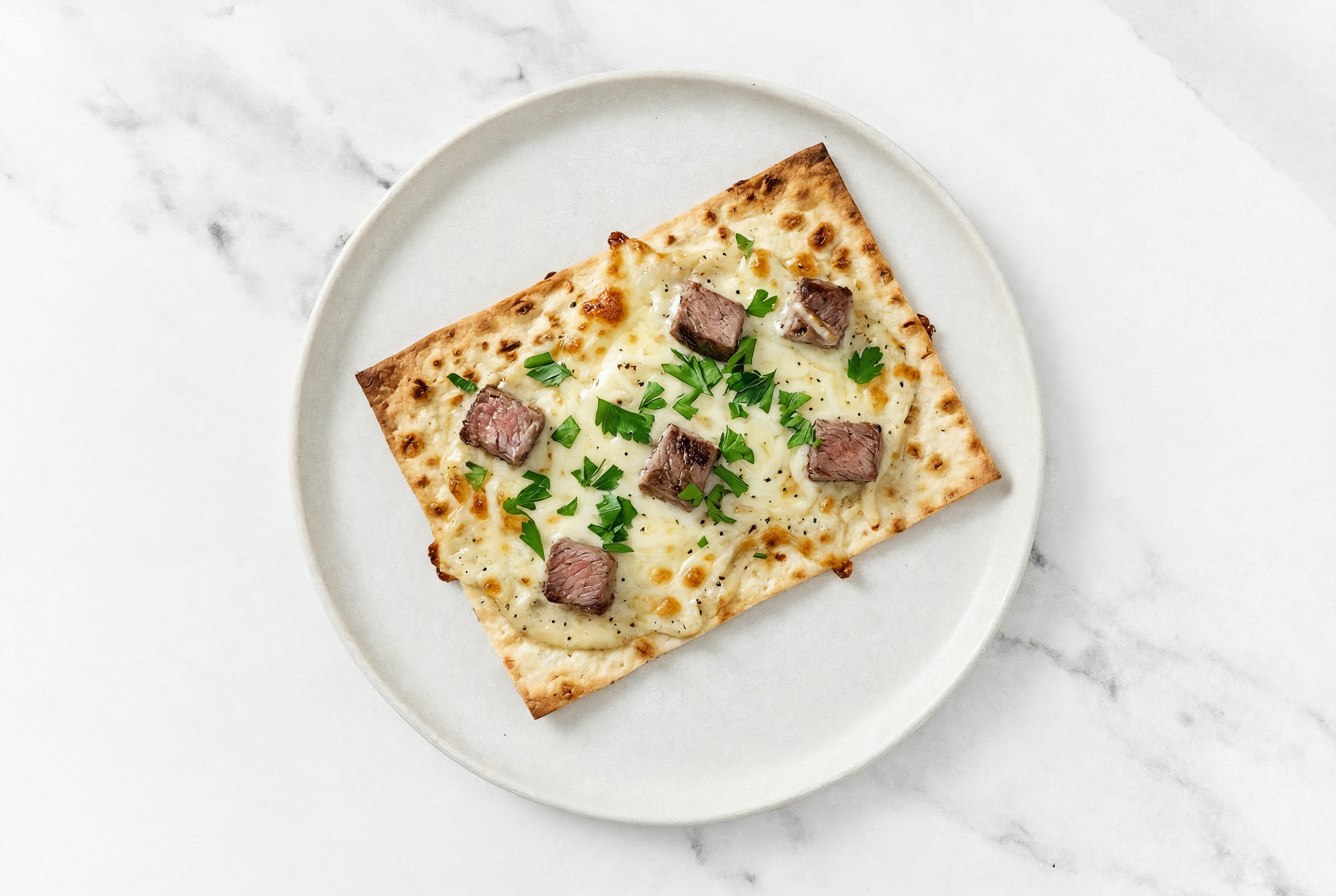 Creamy Filet Mignon Lavash Pizza with Mozzarella + Fresh Parsley