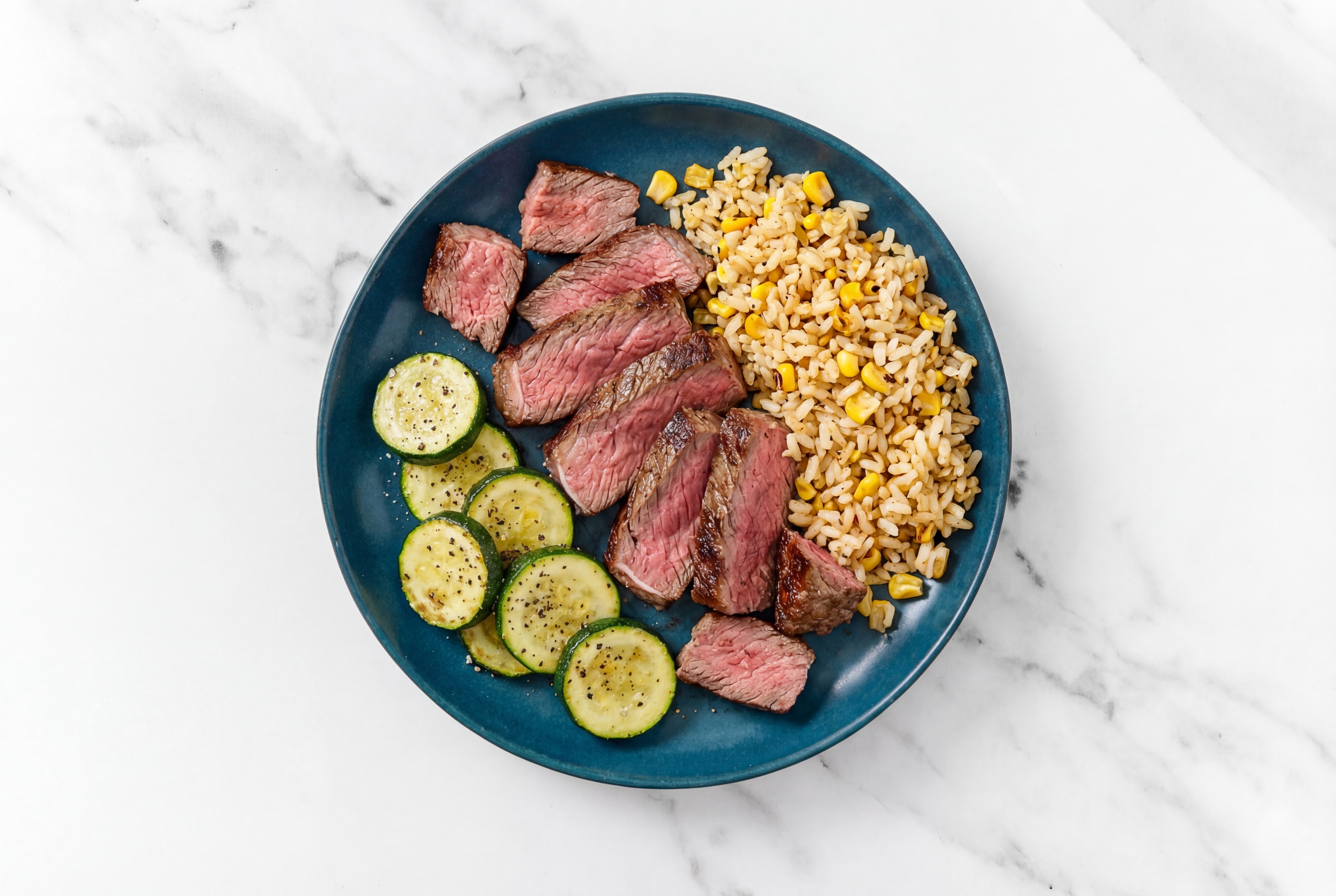 Hearty Sirloin Steak + Mexican Rice with Zucchini
