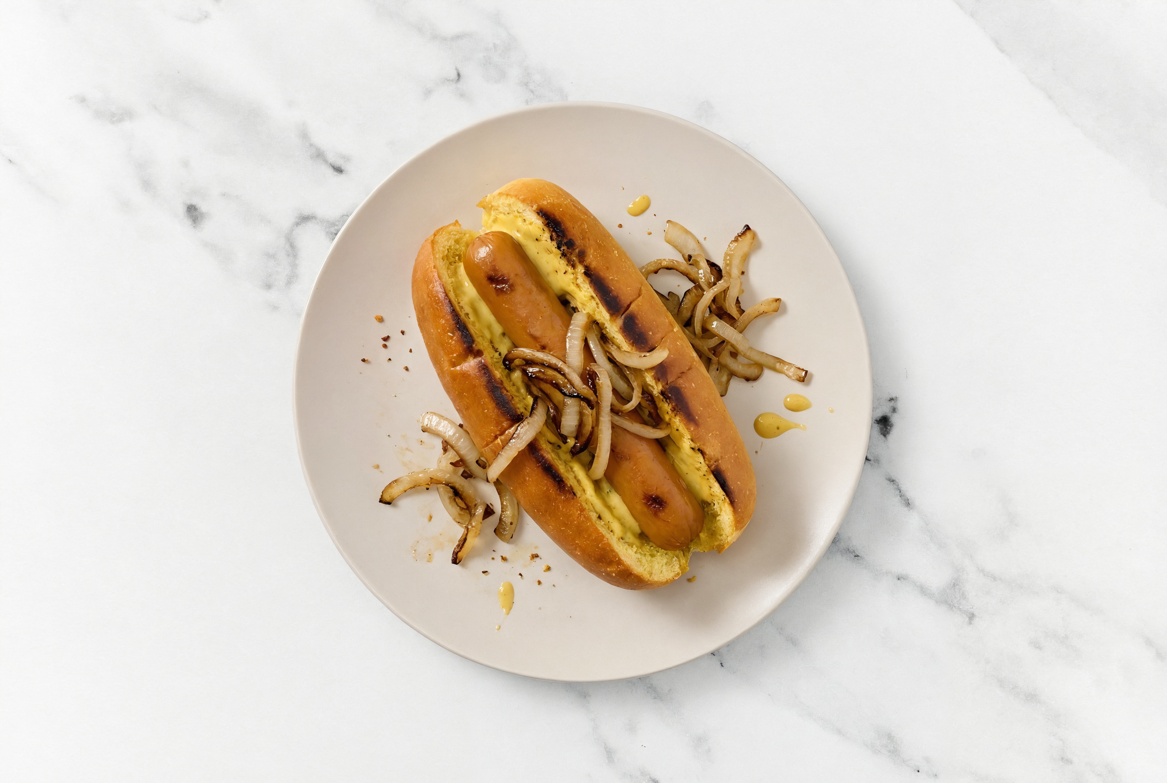 Carmelized Onion Smart Dog with Honey Mustard on Brioche
