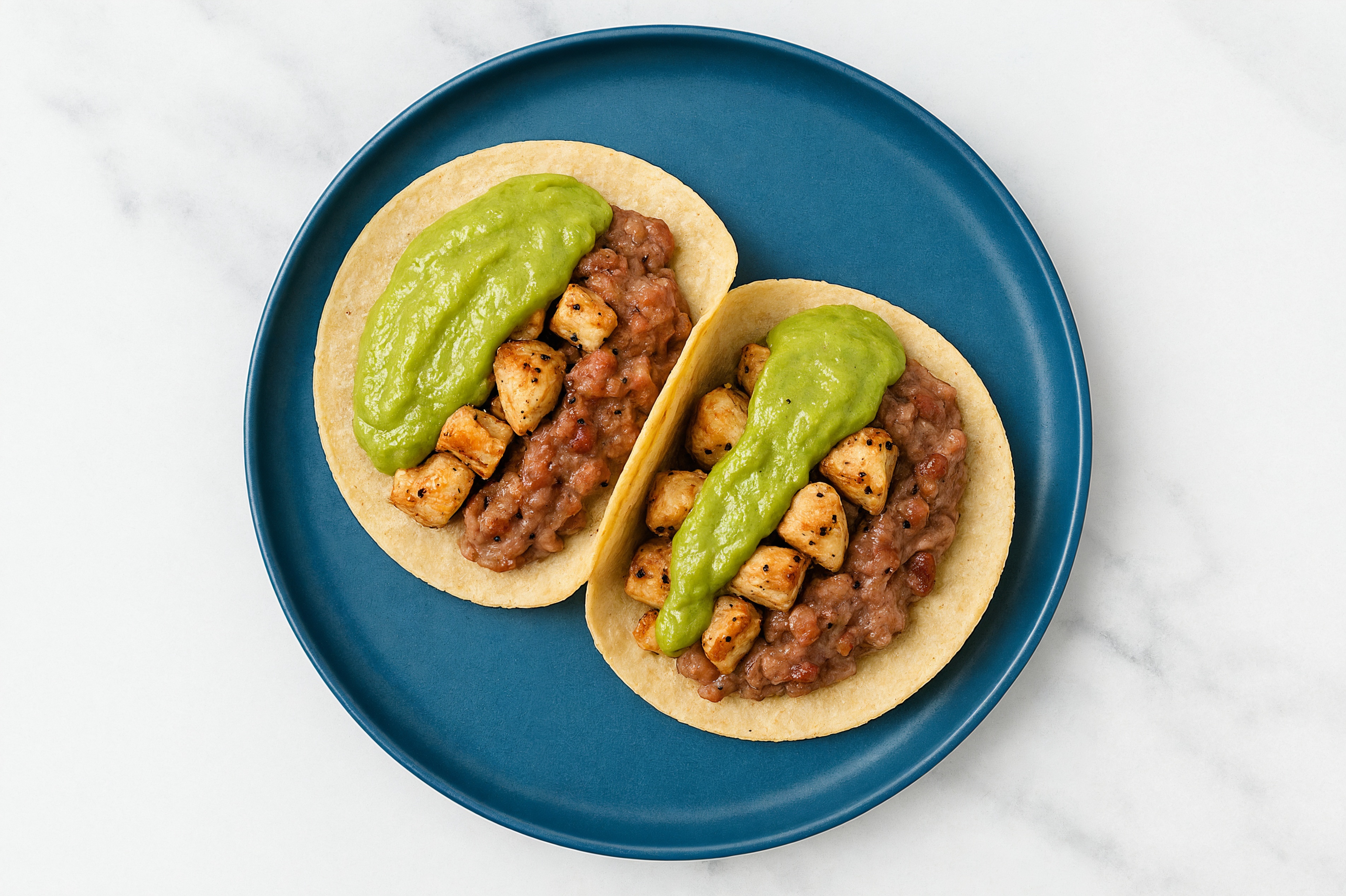 Garlic Turkey Tacos with Avocado & Refried Red Beans