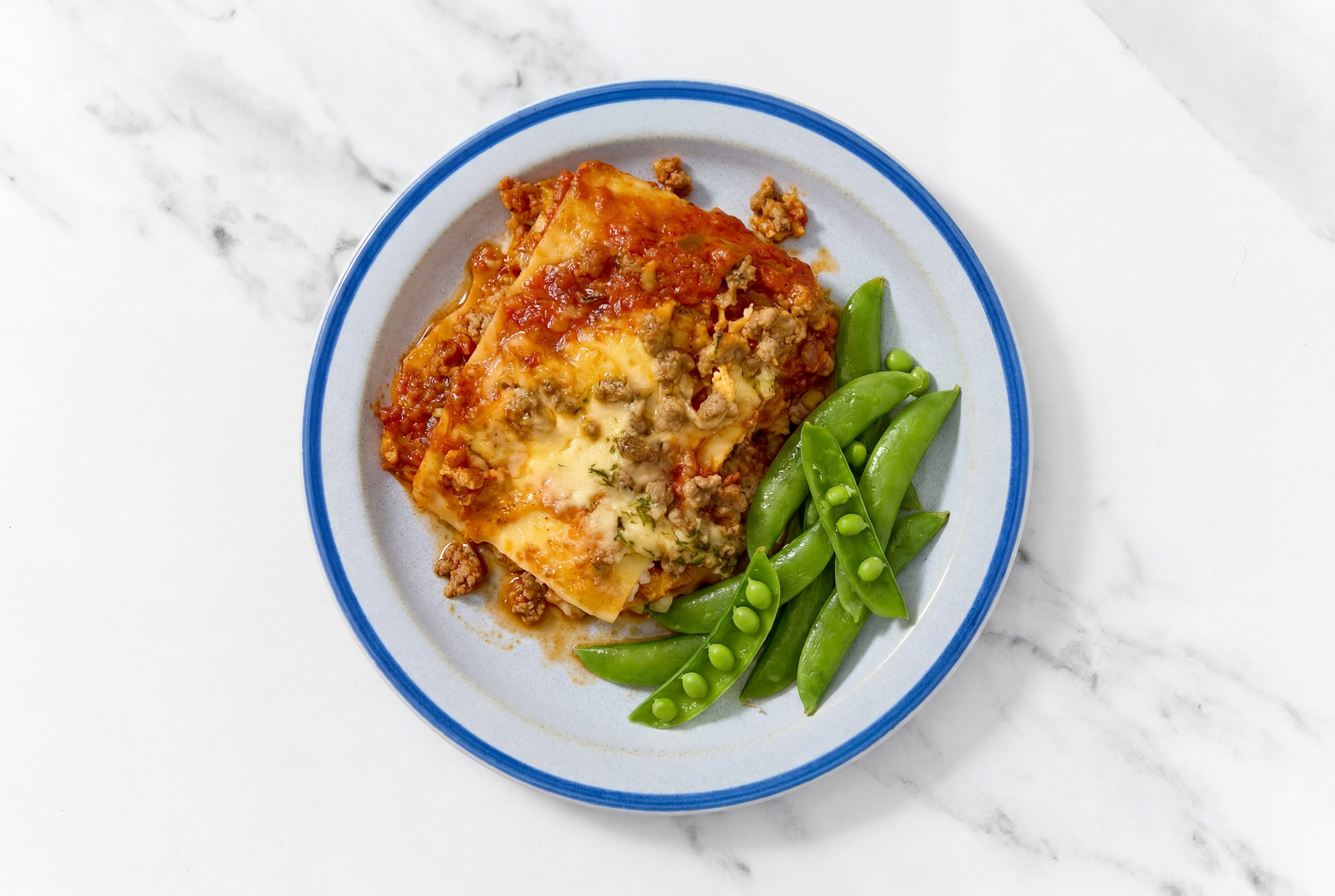 Lasagna Bolognese with Snap Peas